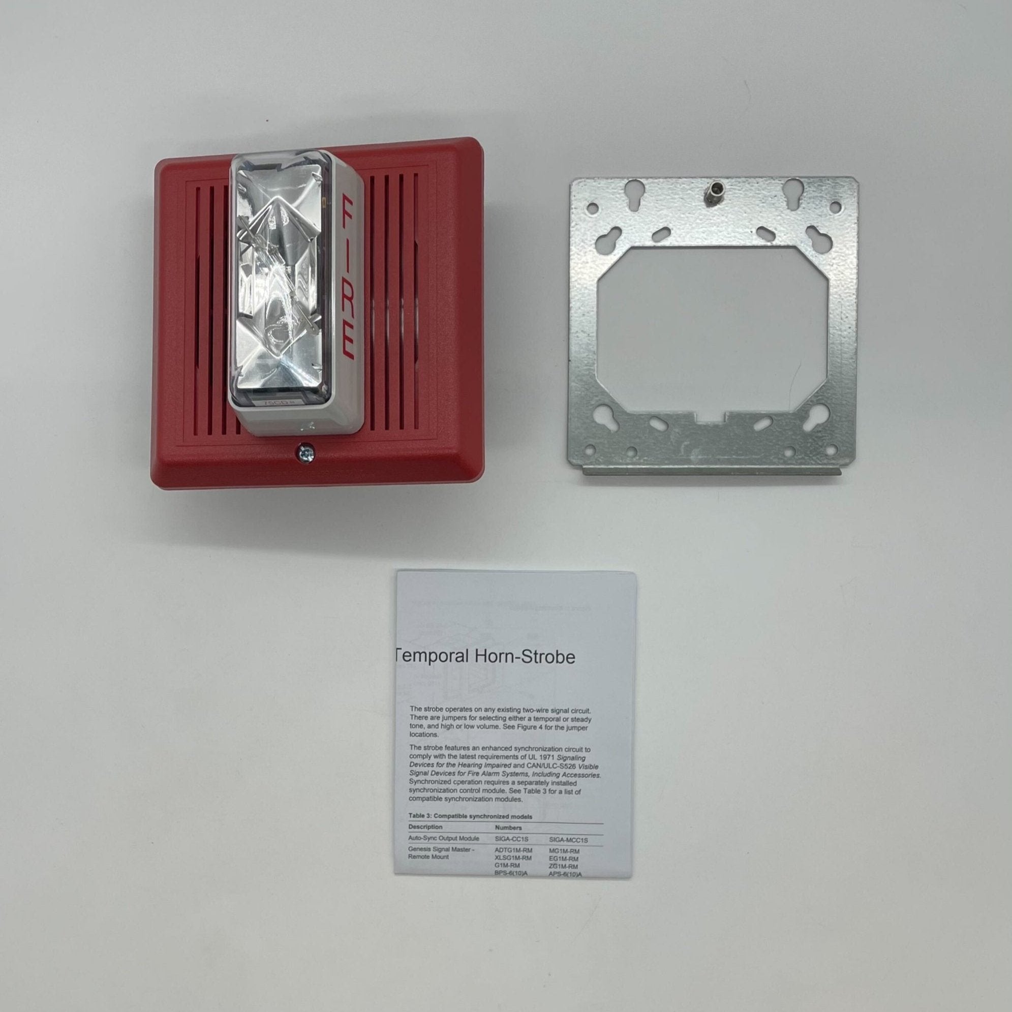 Edwards 757-4A-T horn strobe with yellow housing and mounting bracket, designed for fire alarm signaling.