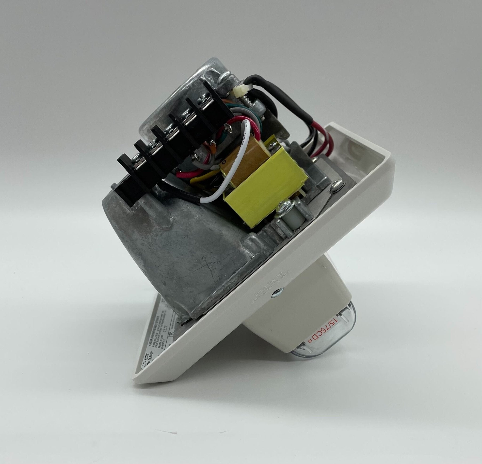 Edwards 757-7A-RS70W speaker strobe light mounted on wall, white emergency signaling device by Edwards.