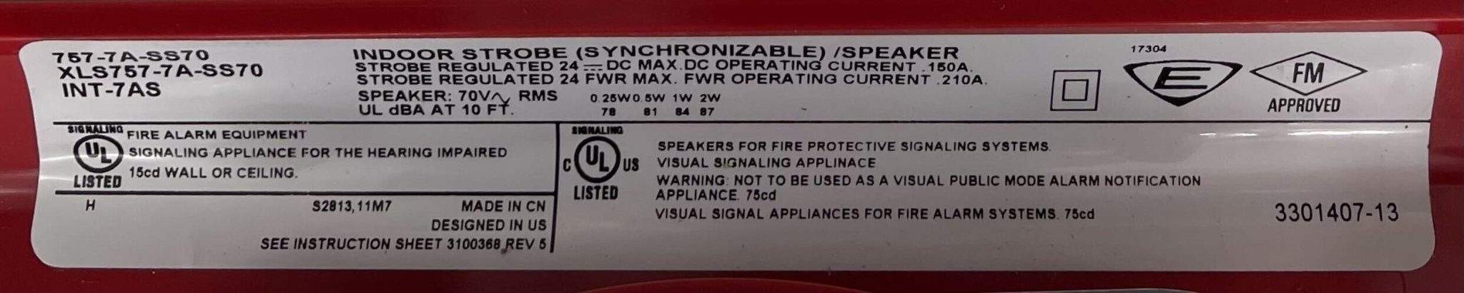 Edwards 757-7A-SS70 speaker strobe with white housing and alert lens, mounted on a ceiling for fire alarm notification.