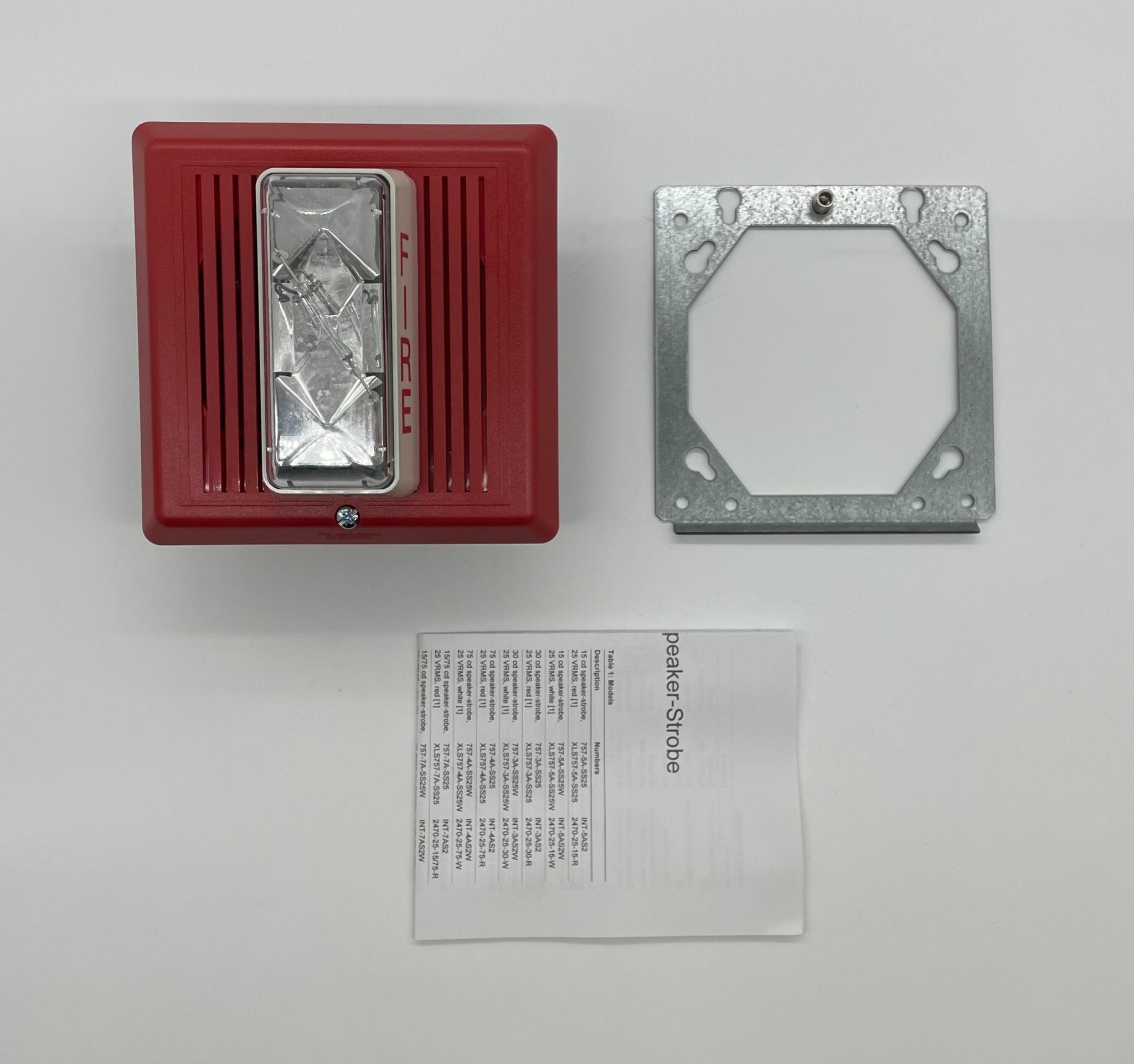 Edwards 757-7A-SS70 speaker strobe light mounted on ceiling, white safety alarm device with flashing strobe for emergency alert.
