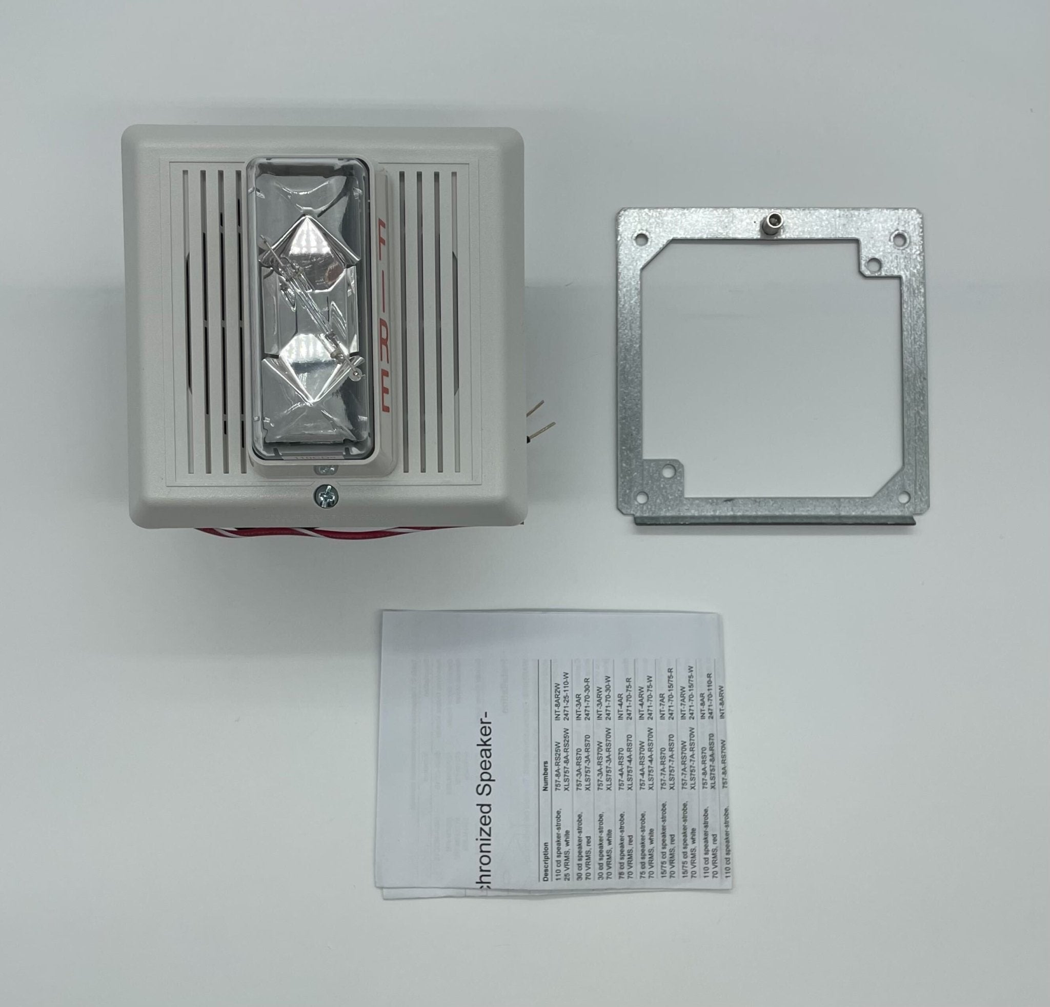 Edwards 757-8A-RS70W speaker strobe light with white lens, mounted on ceiling for emergency alert signaling.