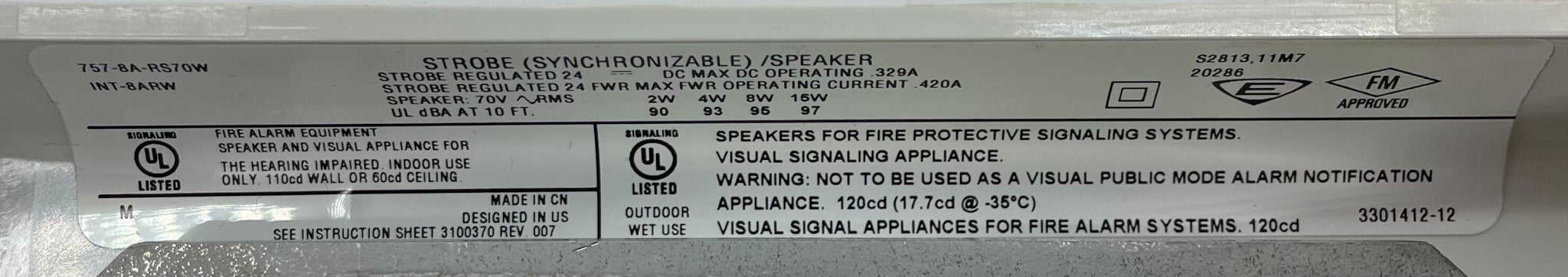 Edwards 757-8A-RS70W speaker strobe with white housing and visible wiring, used for fire alarm notification in commercial settings.