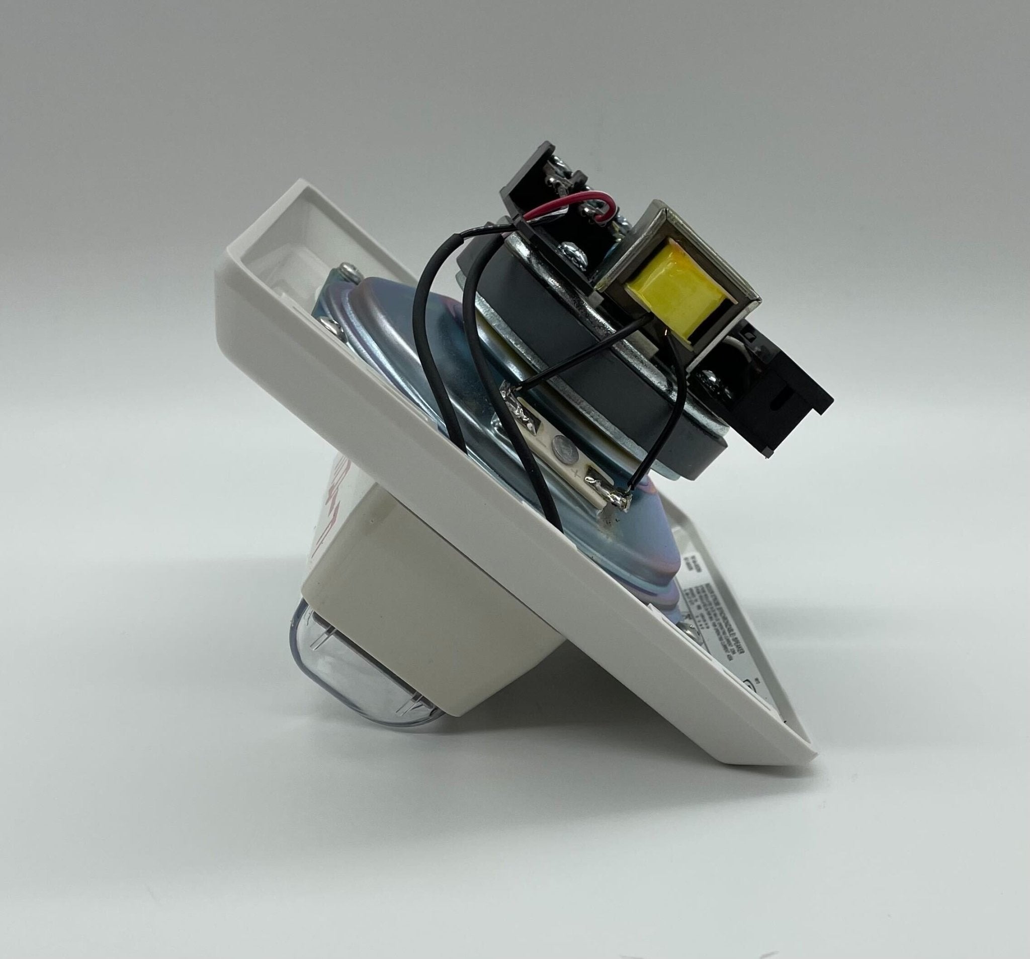 Edwards 757-8A-SS25W speaker strobe light with white housing, mounted on ceiling for emergency notification system.