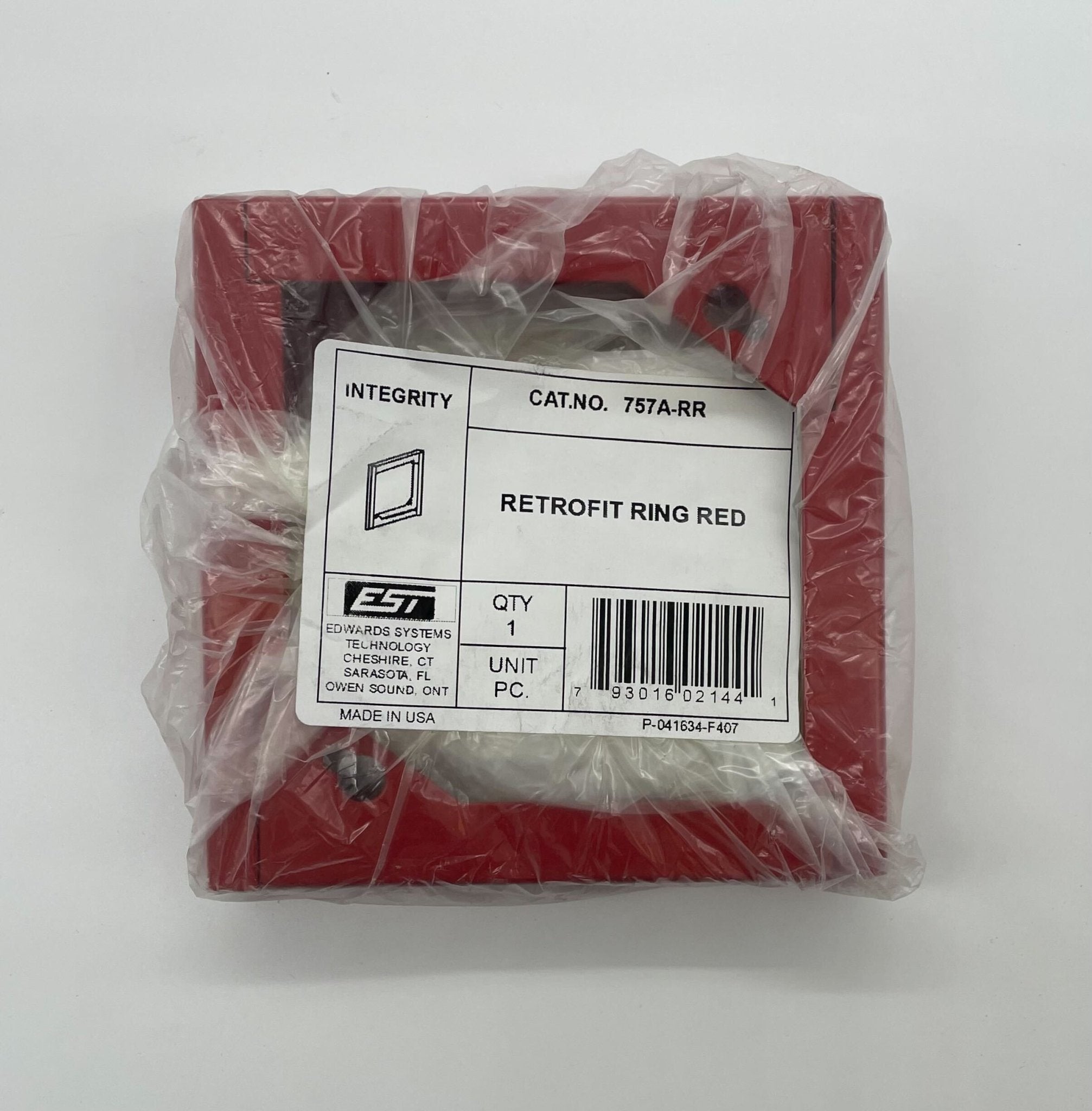 Edwards 757A-RR fire alarm with red alert button and testing feature, mounted on wall for fire safety protection.