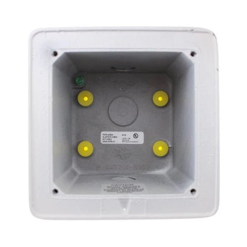Edwards 757A-WBW fire alarm with white wiring base, mounted on a ceiling, in a commercial building setting
