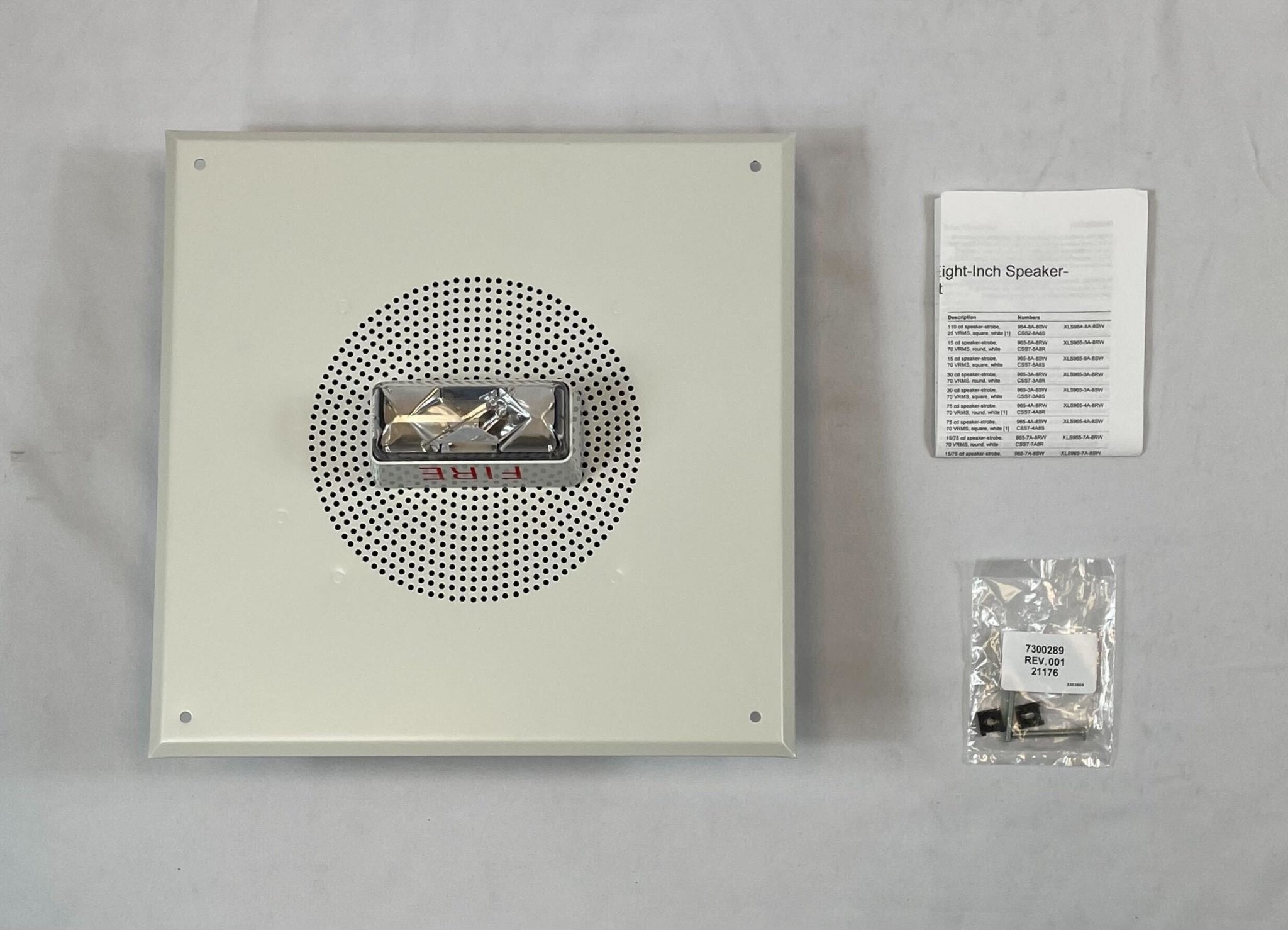 Edwards 965-7A-8SW speaker strobe alarm device with white finish, mounted on wall for fire and emergency signaling.