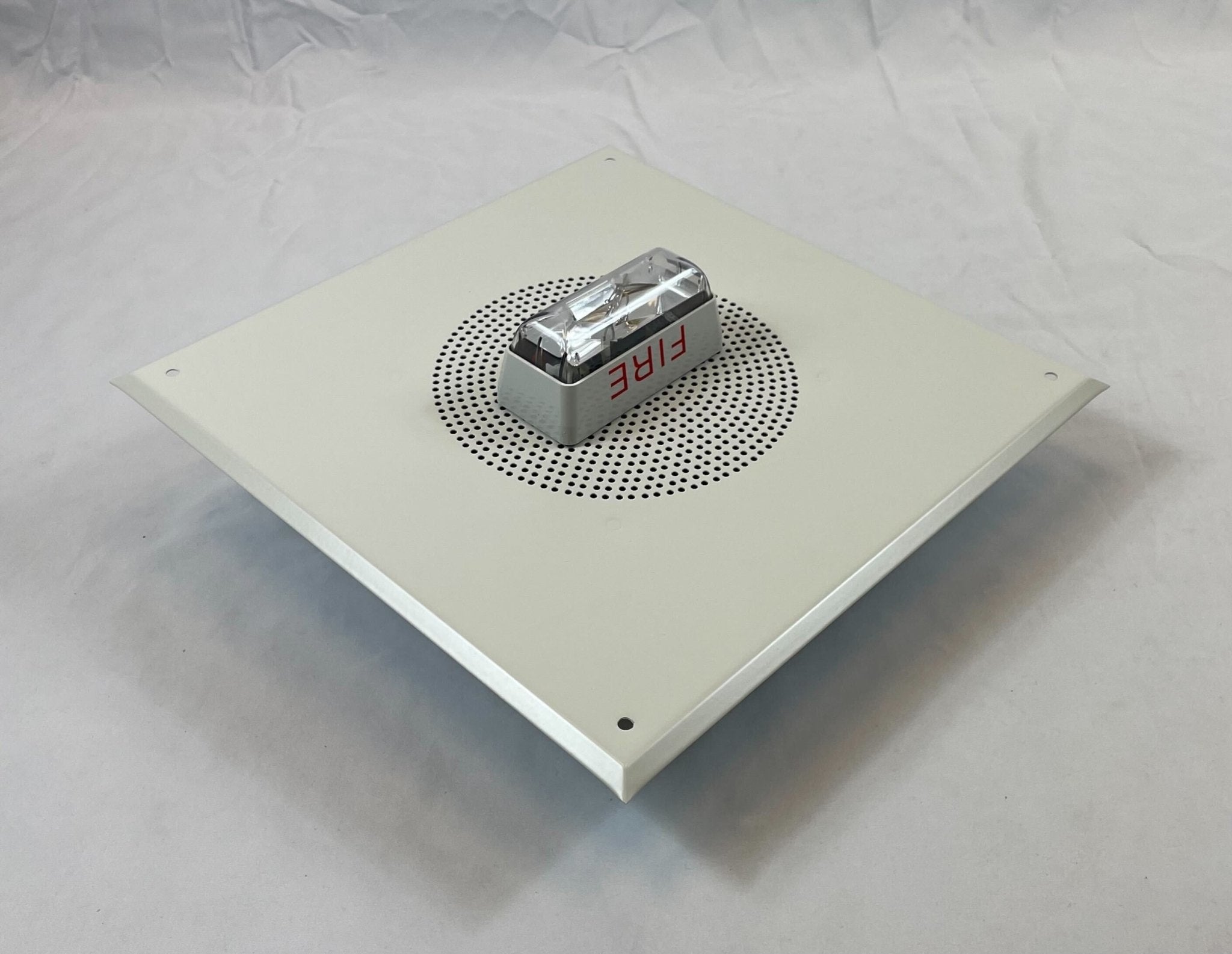 Edwards 965-7A-8SW speaker strobe with red housing and mounting brackets for emergency alert systems.