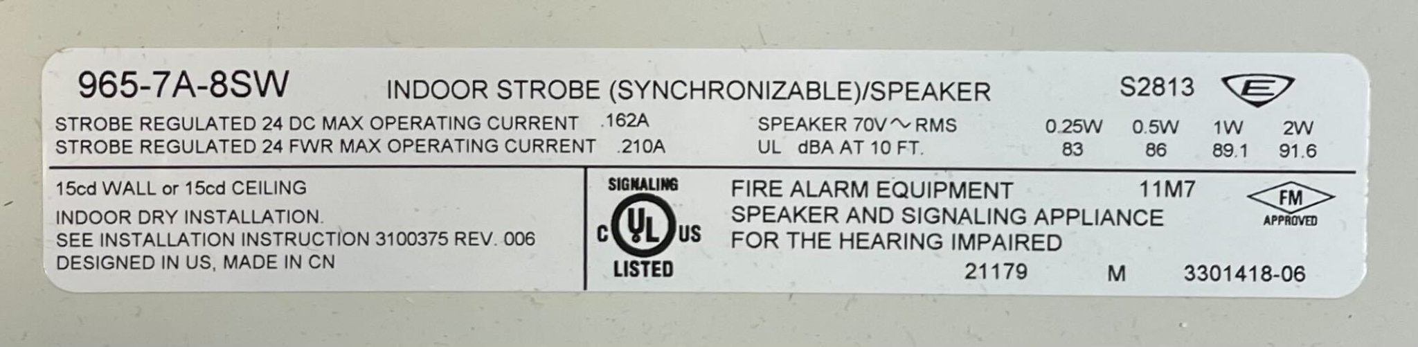 Edwards 965-7A-8SW speaker strobe with white cover, visible mounting hardware, and warning lens for fire alarm systems
