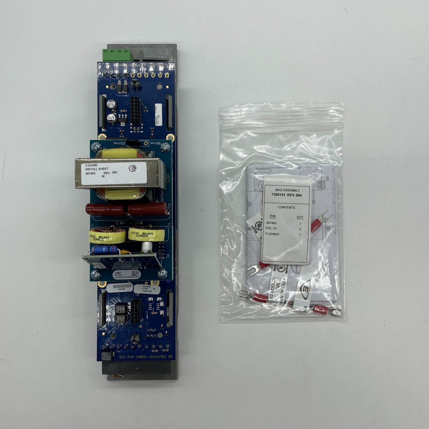 Edwards 3-ZA40B fire alarm sensor with ULC certification, mounted on wall, part of Edwards fire alarm system in a building.