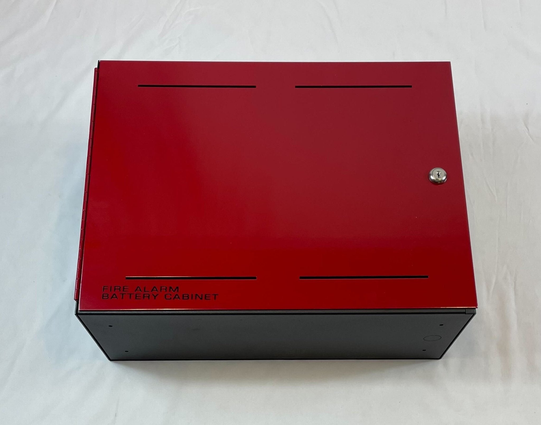 Edwards BC-1R backbox mounted on a wall, part of Jem Systems Canada, showing its sturdy metal construction and installation features.