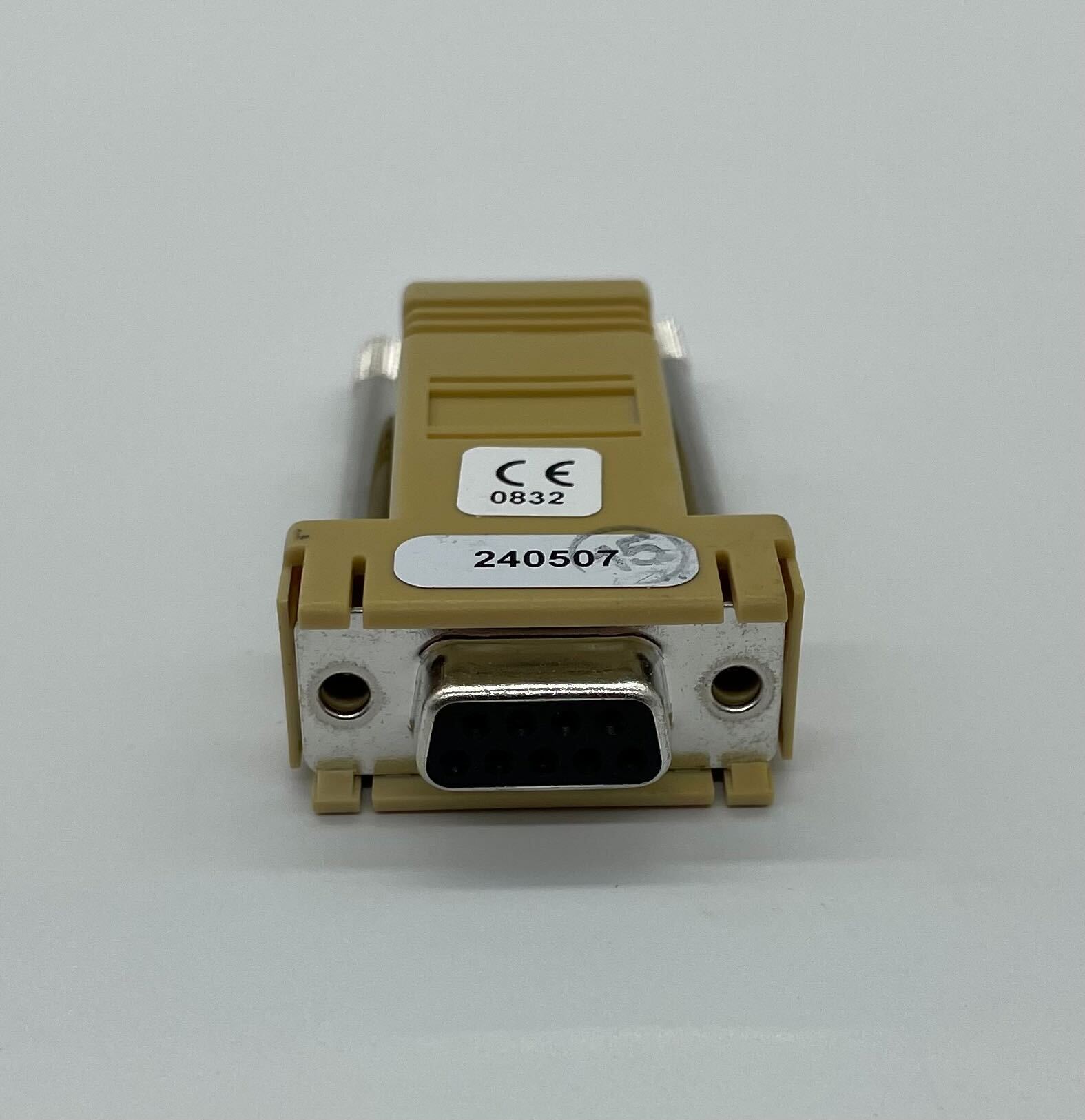 Edwards DB9/RJ11 fire alarm connector with black plastic housing and metal contacts for communication and alarm systems.