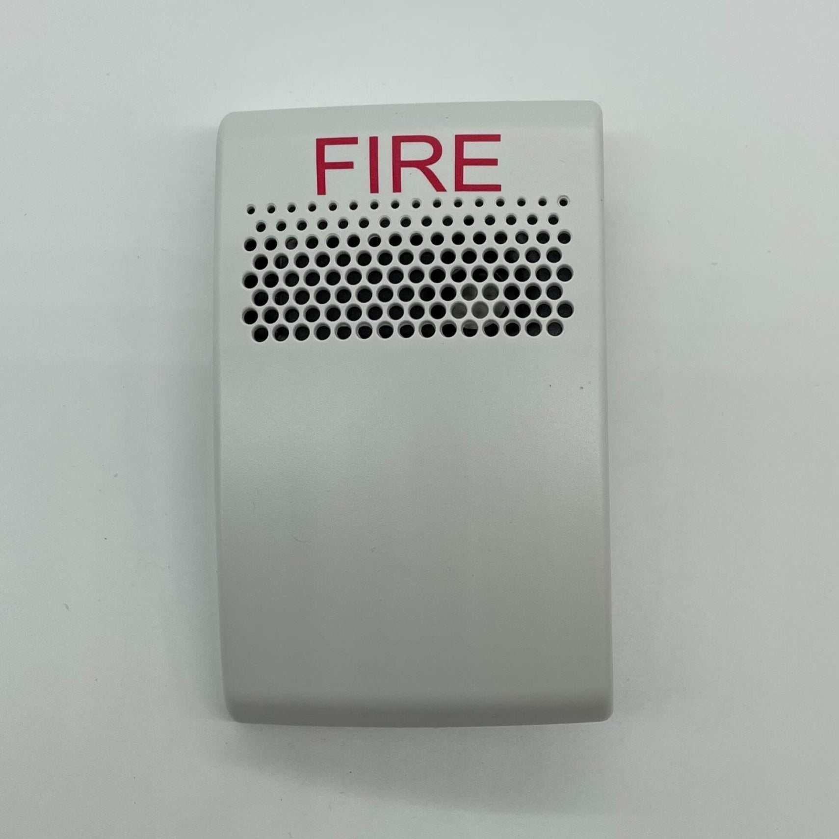 Edwards EG1AWF horn by Edwards, mounted on a wall with visible mounting brackets and wiring for sound projection.