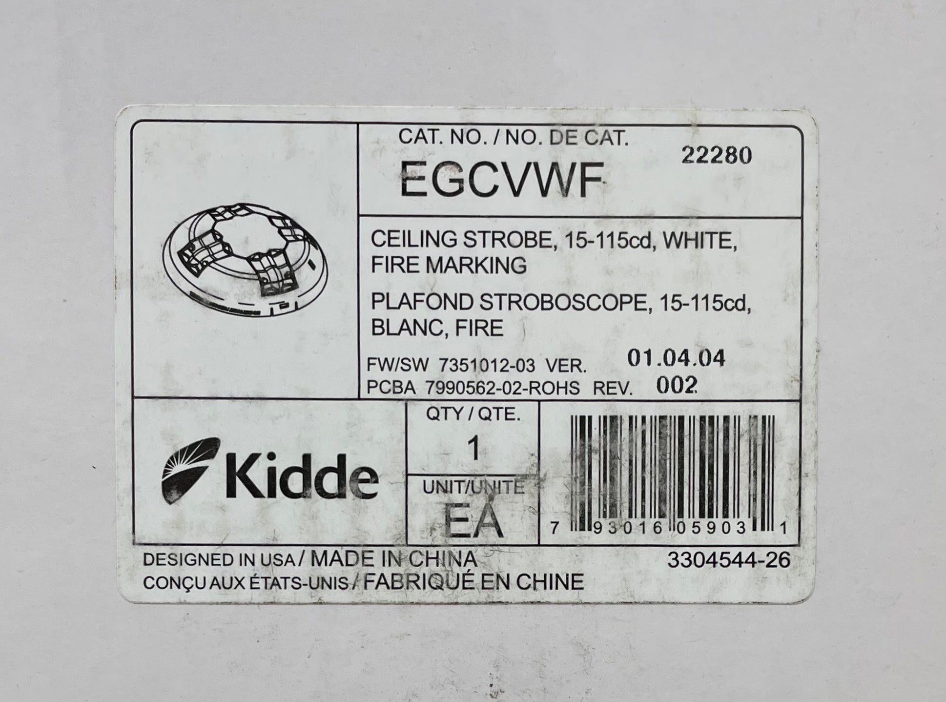Edwards EGCVWF strobe light mounted on a system, with visible wiring and mounting hardware for industrial warning applications.
