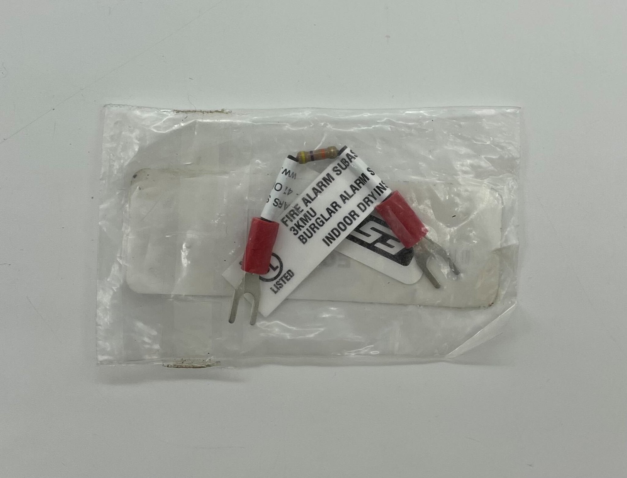 Edwards EOL-47 EOL resistor showing its compact cylindrical design and labeling for electrical circuit use.