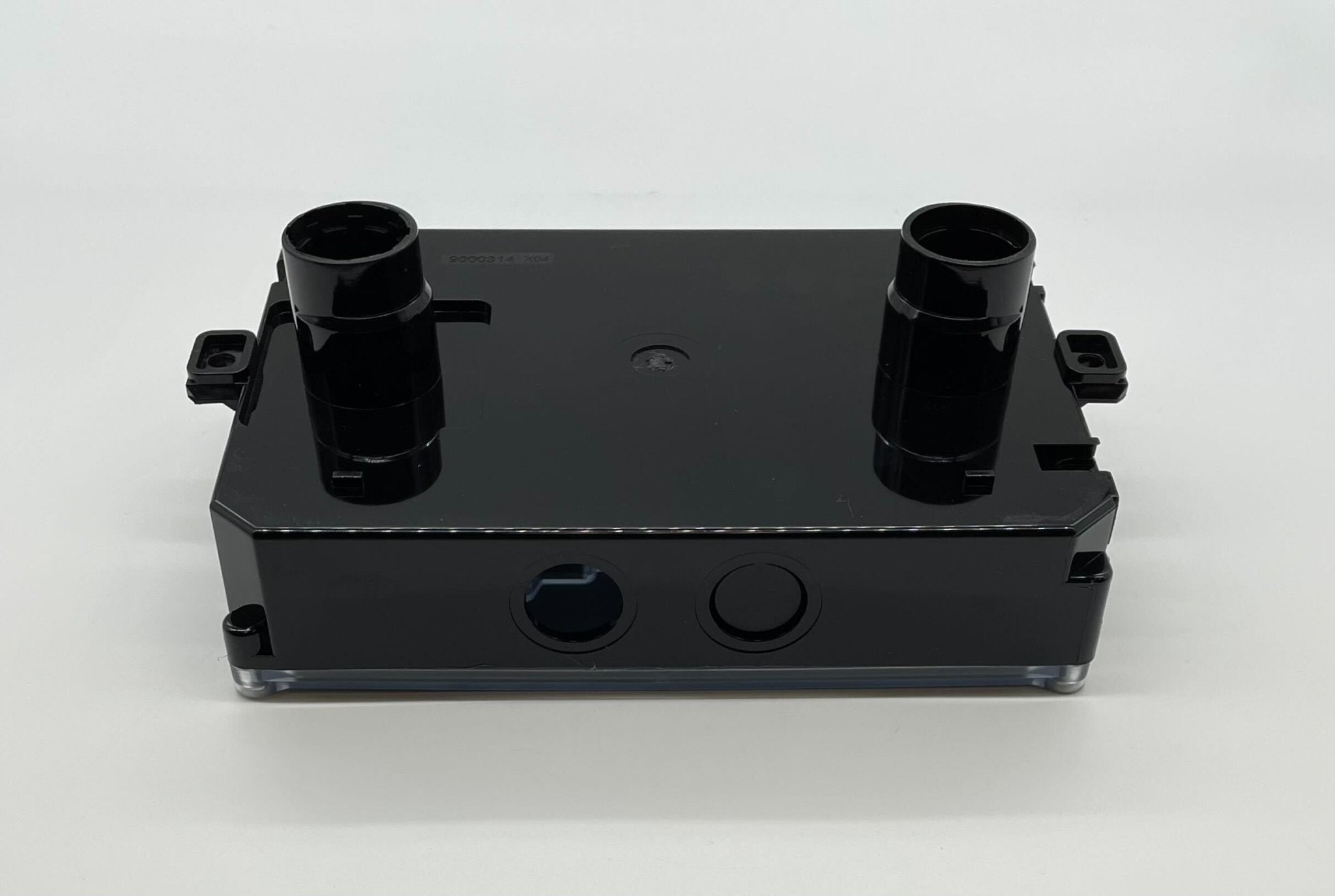 Edwards ESD-ST fire alarm detector mounted on ceiling, with a sleek white design for smoke detection in commercial spaces.