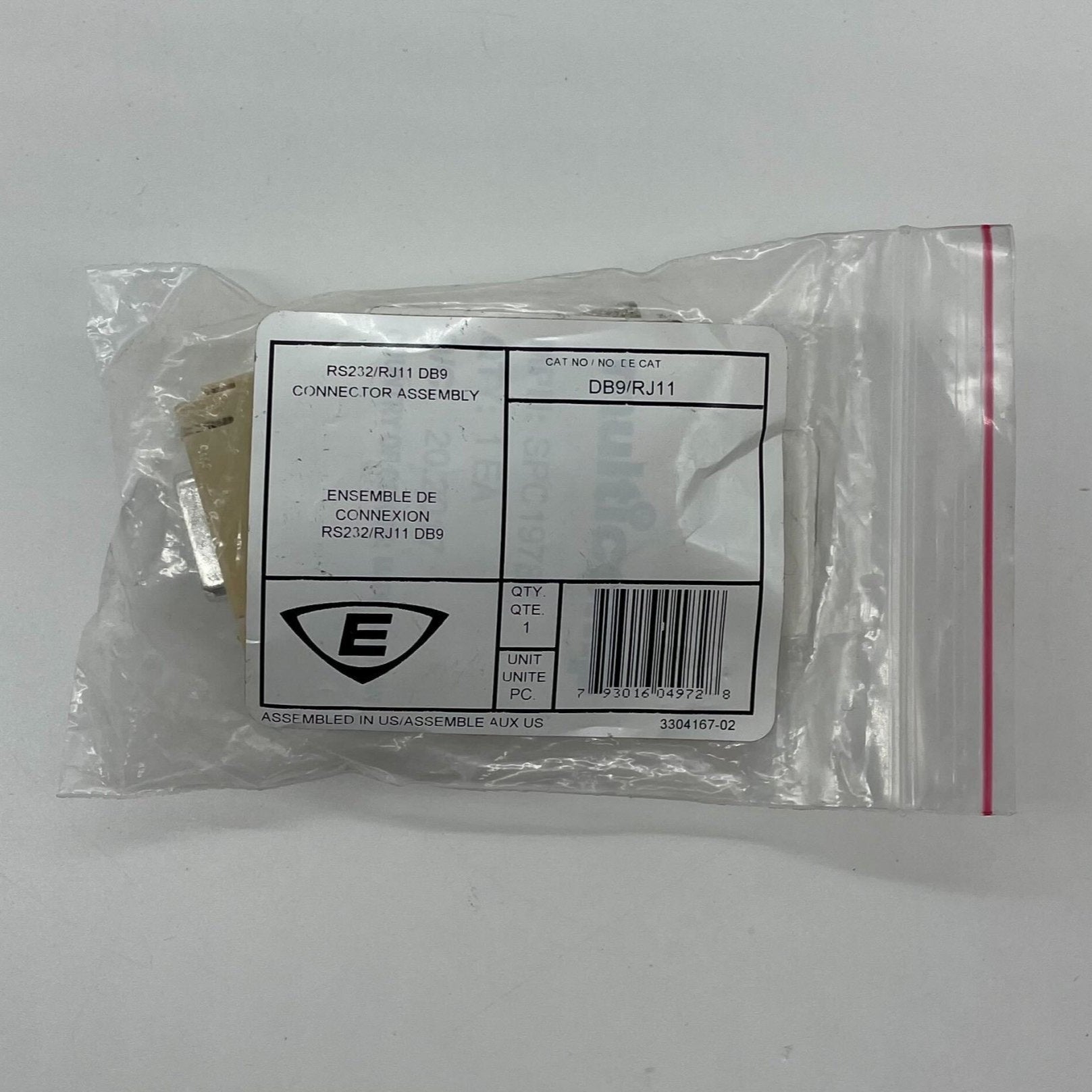 Edwards DB9/RJ11 fire alarm connector with metallic ports and black plastic casing, used for Edwards fire alarm systems.