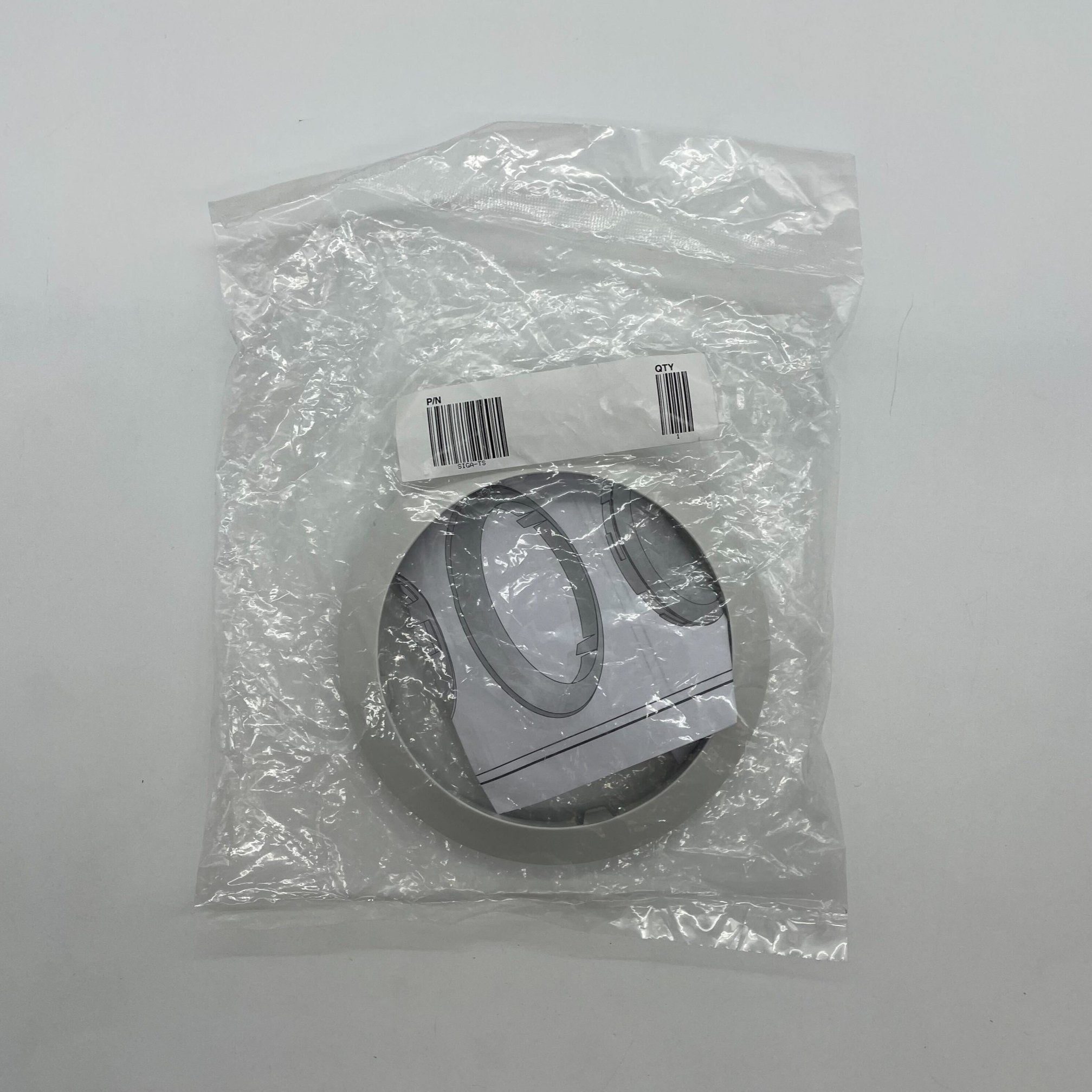 Edwards SIGA-TS fire alarm sensor system with ULC certification, mounted on wall, part of Edwards fire alarm safety system.