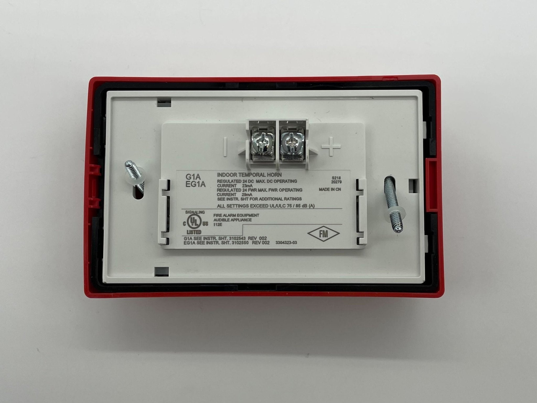 Edwards G1ARF Compact Wall Horn mounted on a wall, black metal construction, used for emergency sound signaling.