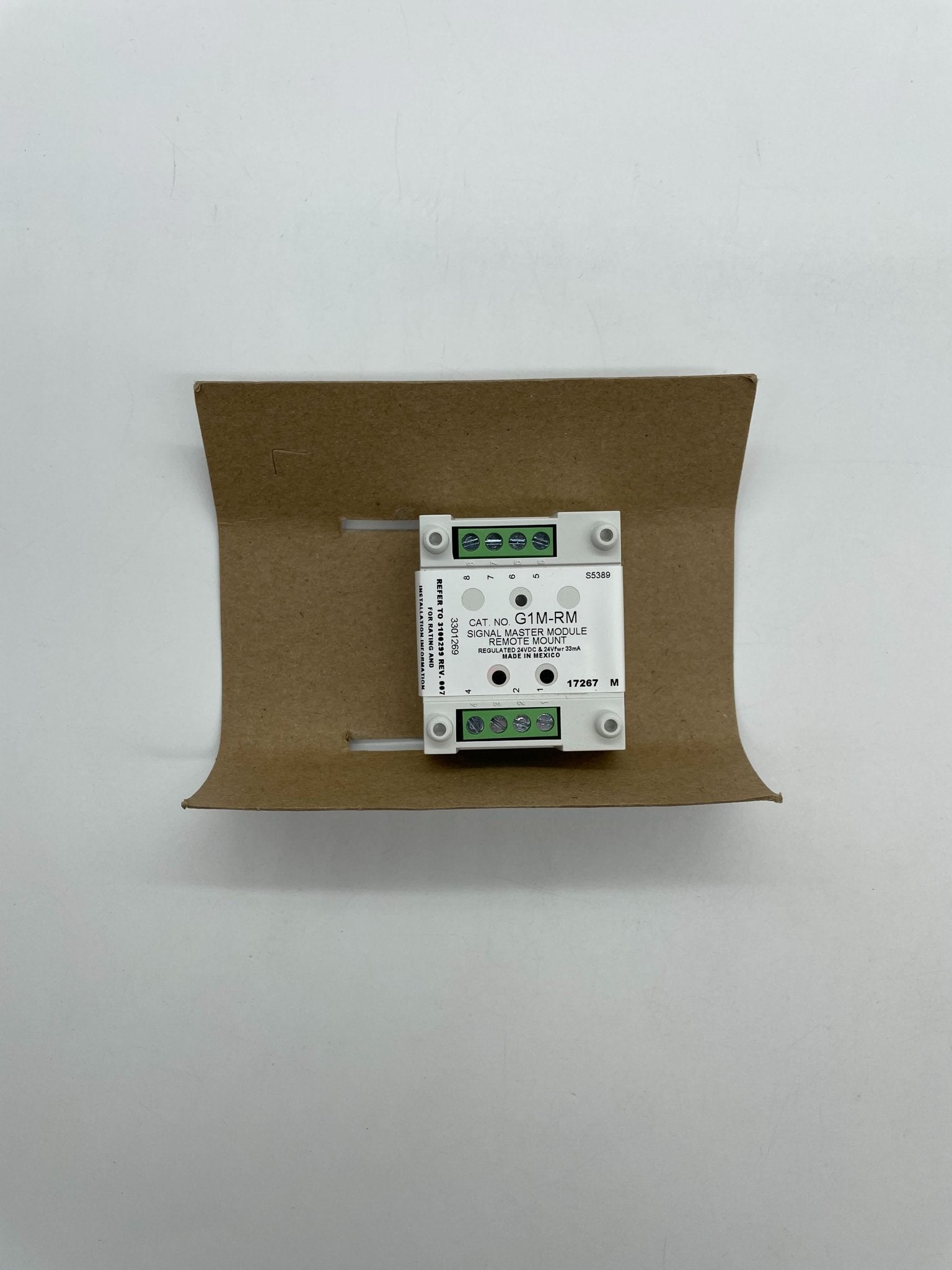 Edwards G1M-RM module by Edwards, shown in a close-up with detailed connectors and components, on a white background.