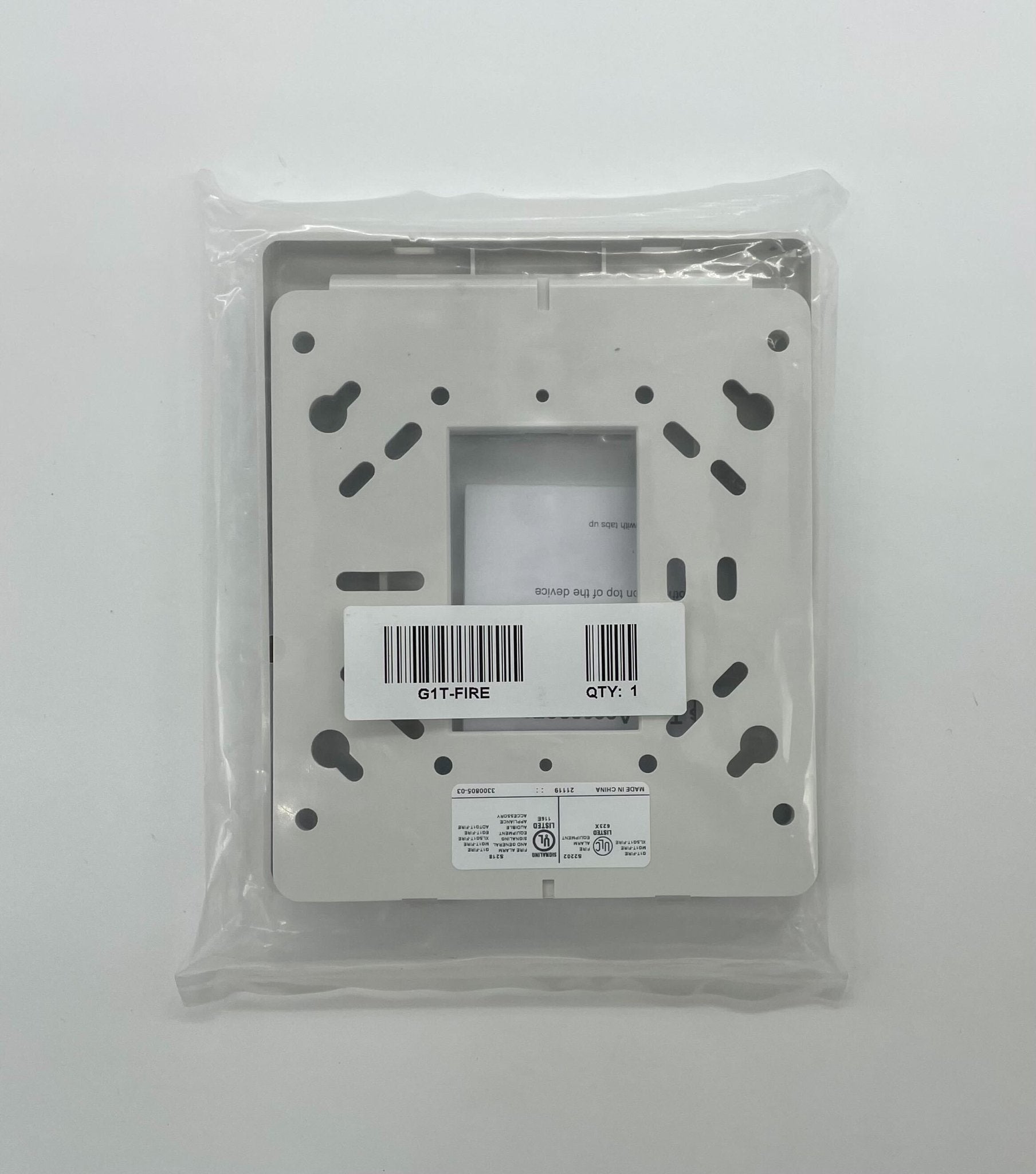 Edwards G1T-FIRE fire alarm device with alarm indicator and mounting bracket, designed for fire safety systems.