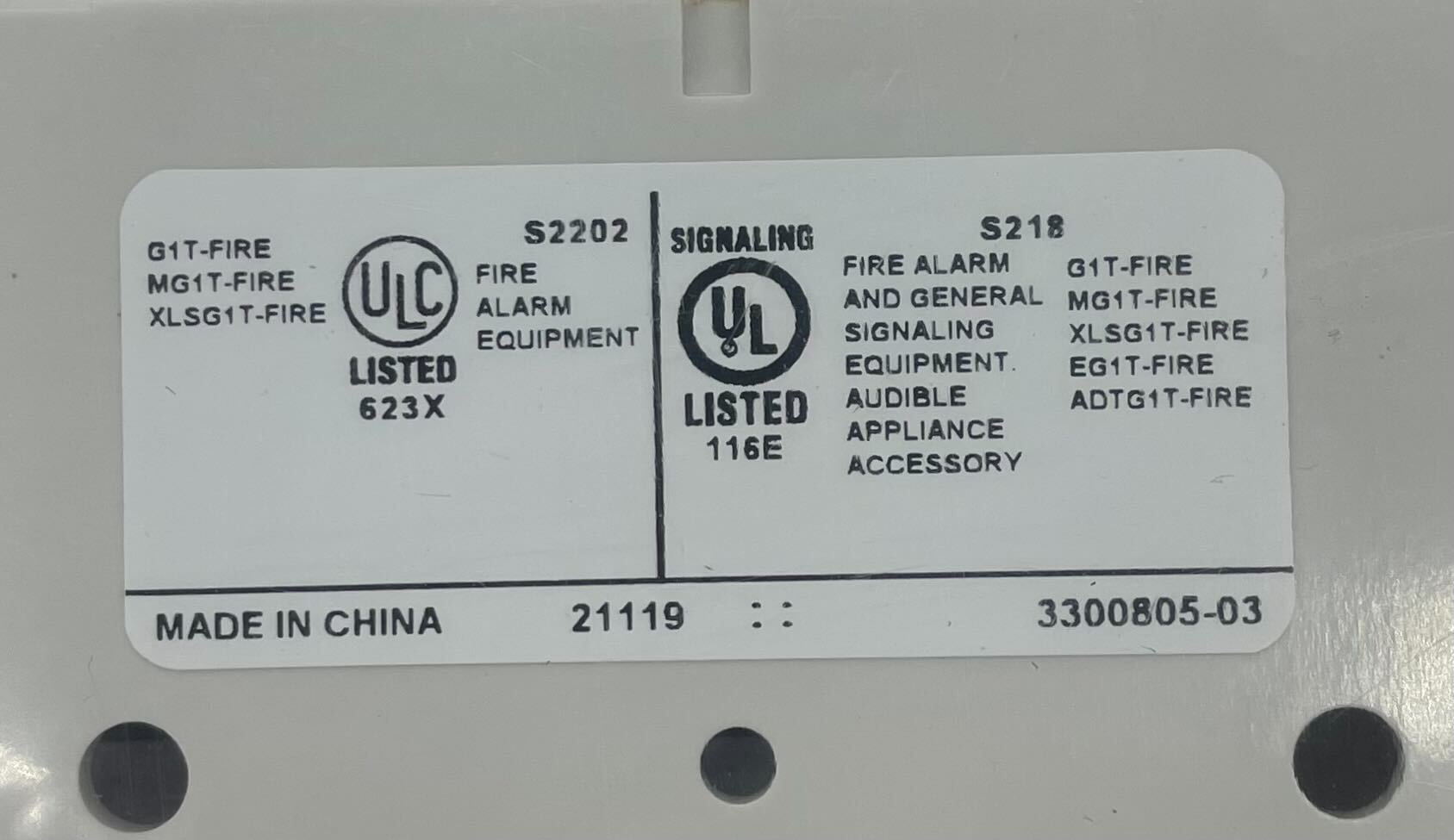 Edwards G1T-FIRE fire alarm with alarm indicator and mounting bracket, designed for fire detection and safety.