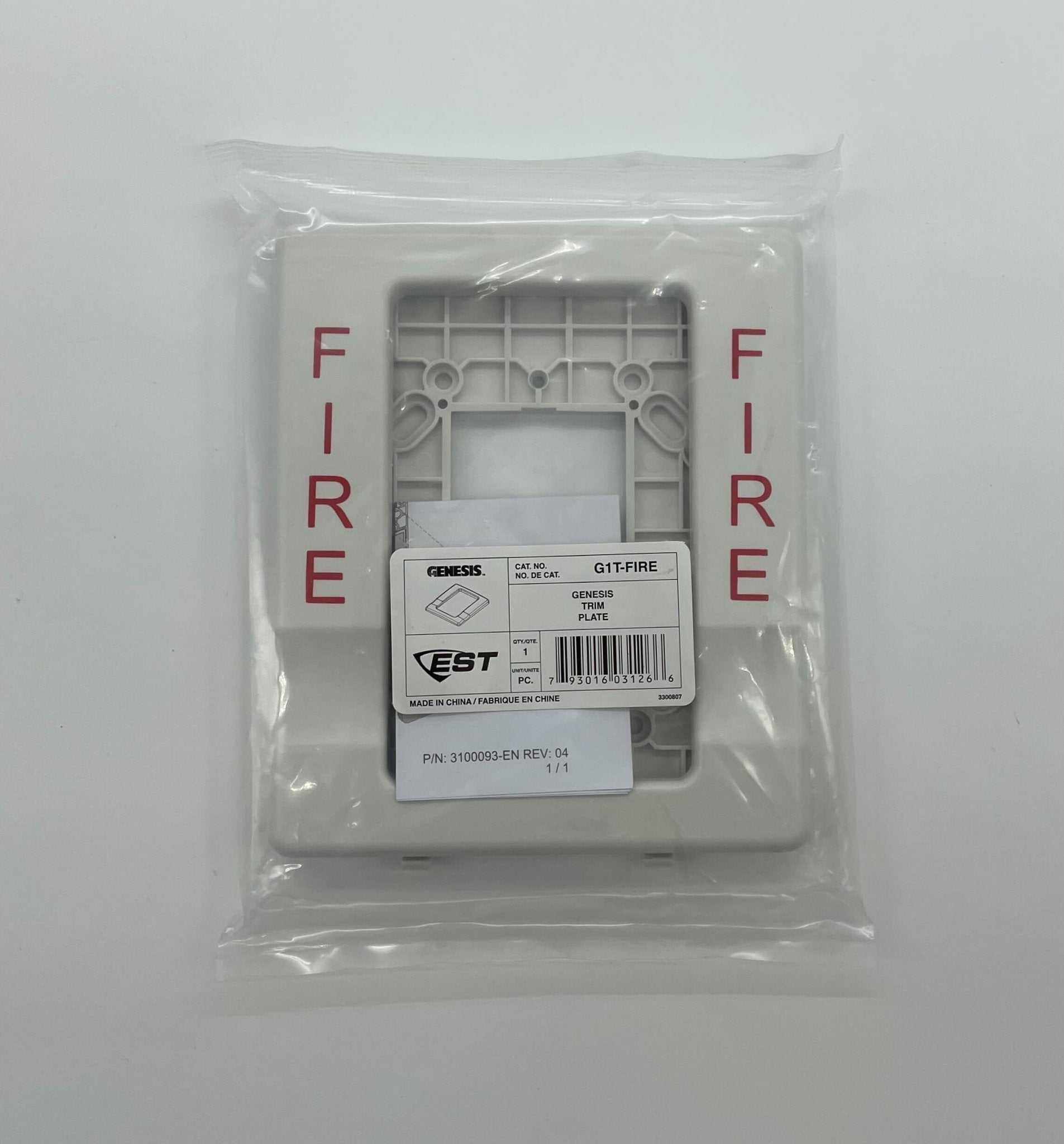 Edwards G1T-FIRE fire alarm with smoke detector and wiring, mounted on a ceiling for fire safety detection.
