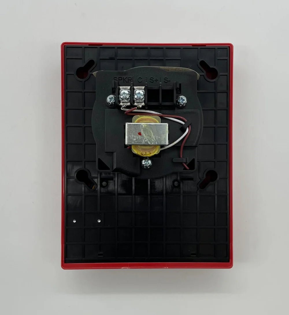 Edwards G4HFRF-S2 fire alarm with sensor and wiring, mounted on a ceiling for smoke detection and safety alert.