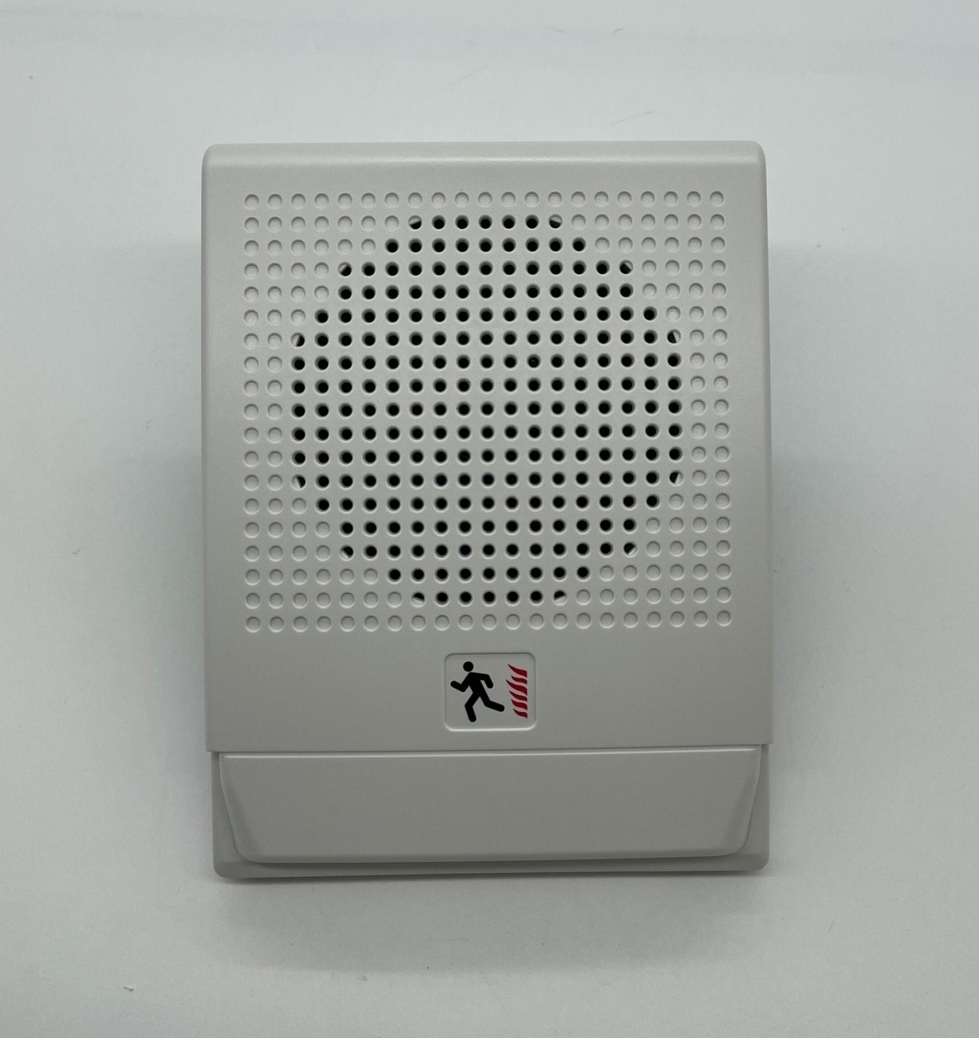 Edwards G4HFWF-S7 speakers mounted on a wall, showcasing their sleek black design and compact size for professional sound setups.