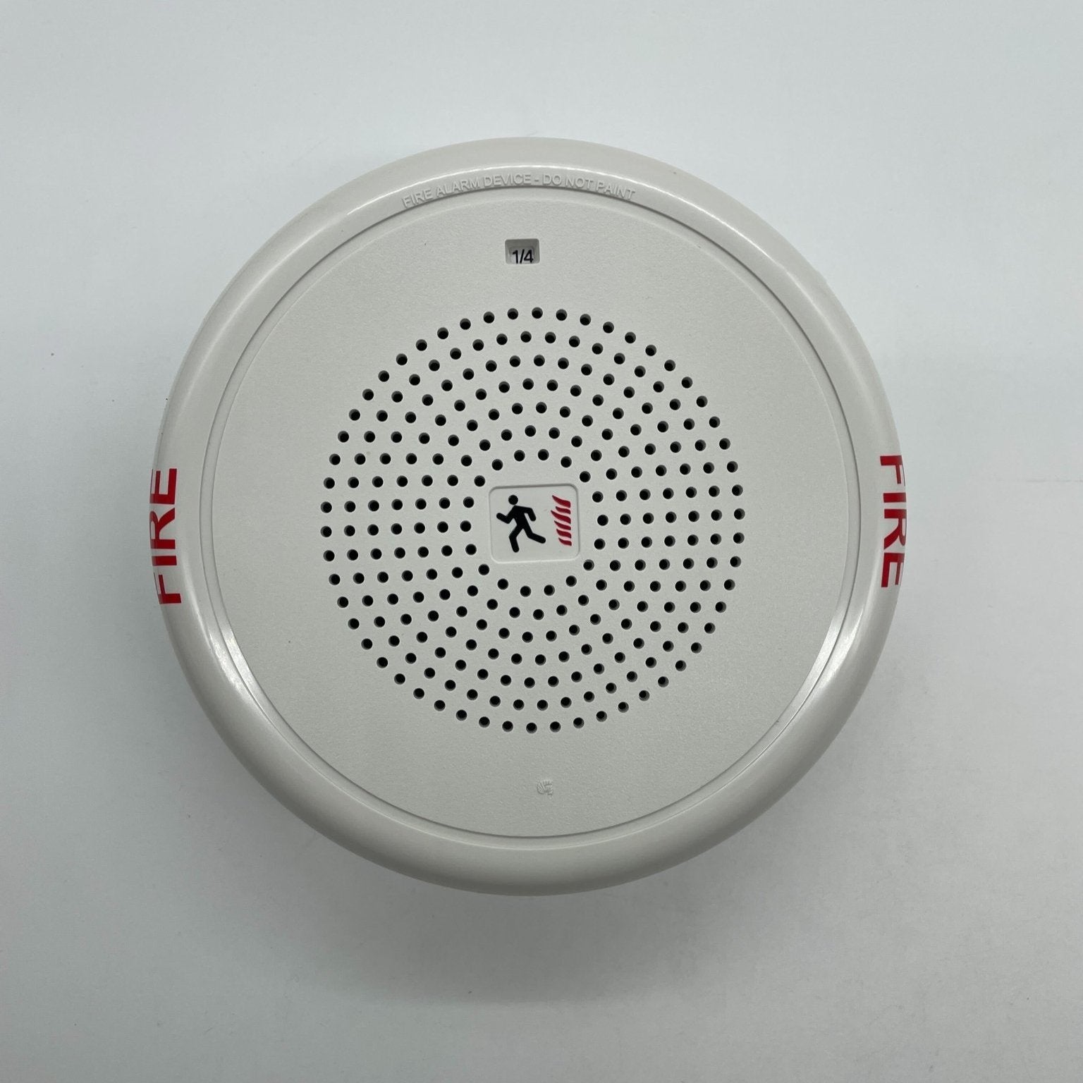 Edwards GCHFWF-S2 fire alarm control panel with digital display and control buttons, mounted on a wall.