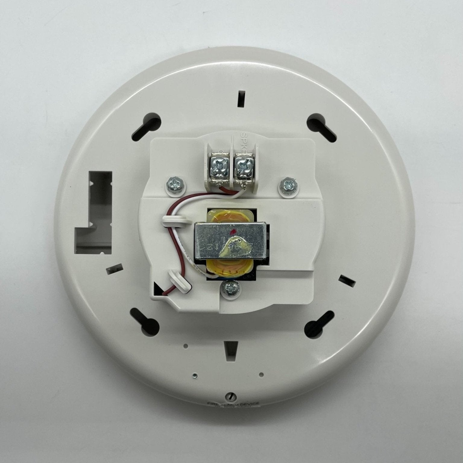 Edwards GCHFWF-S2 fire alarm control panel with digital display and control buttons, mounted on a wall.