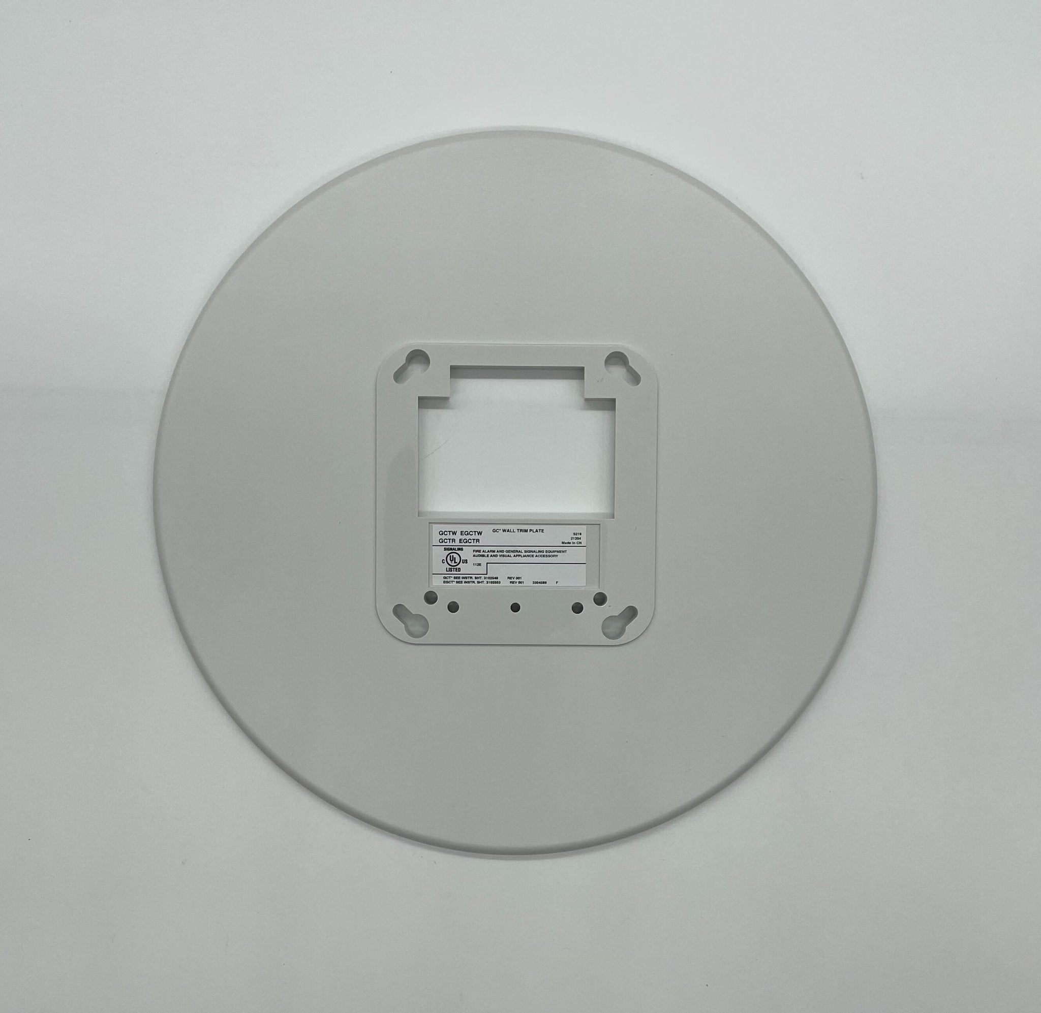 Edwards GCTW fire alarm installed on ceiling, with visible sensor and wiring for safety and fire detection in commercial spaces.