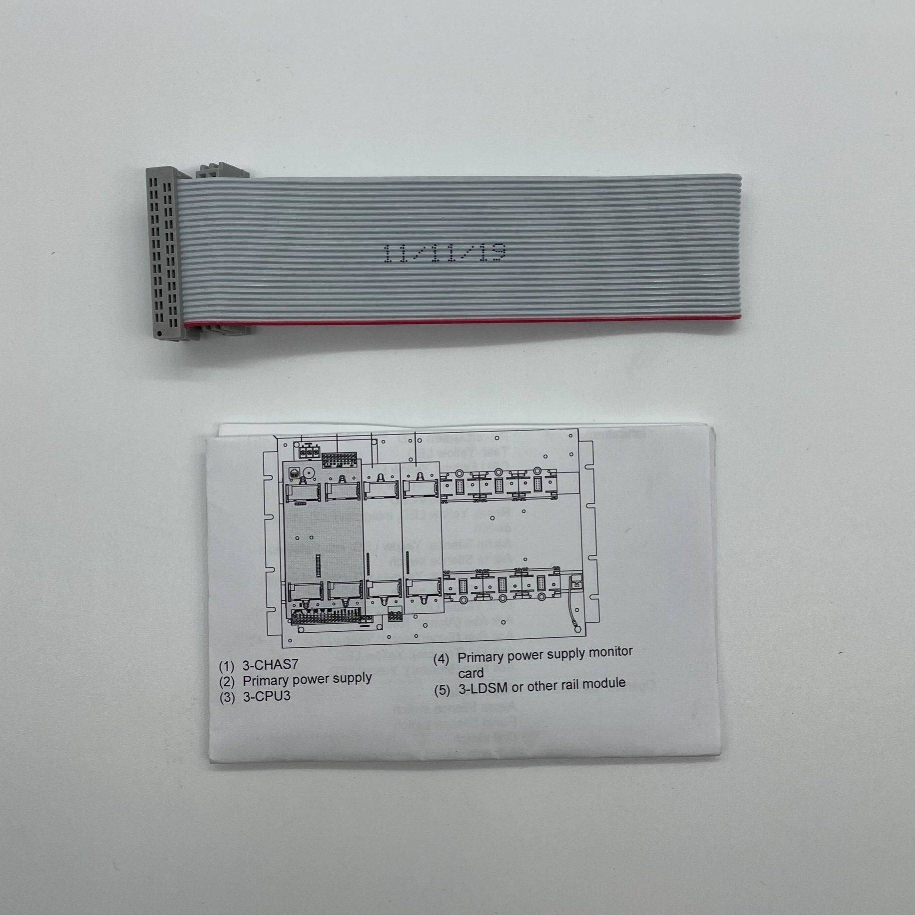 Edwards 3-LCDXL1KBL fire alarm with LCD display and black casing, mounted on a ceiling for fire detection.