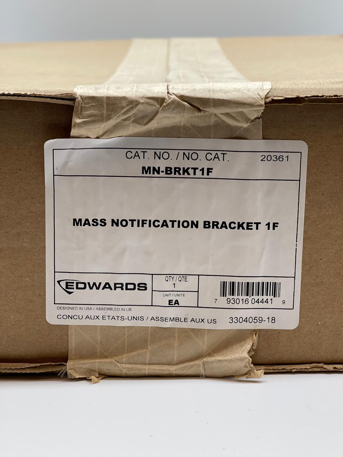 Edwards MN-BRKT1F fire alarm mounting bracket for Edwards fire alarms, shown installed on a ceiling or wall.