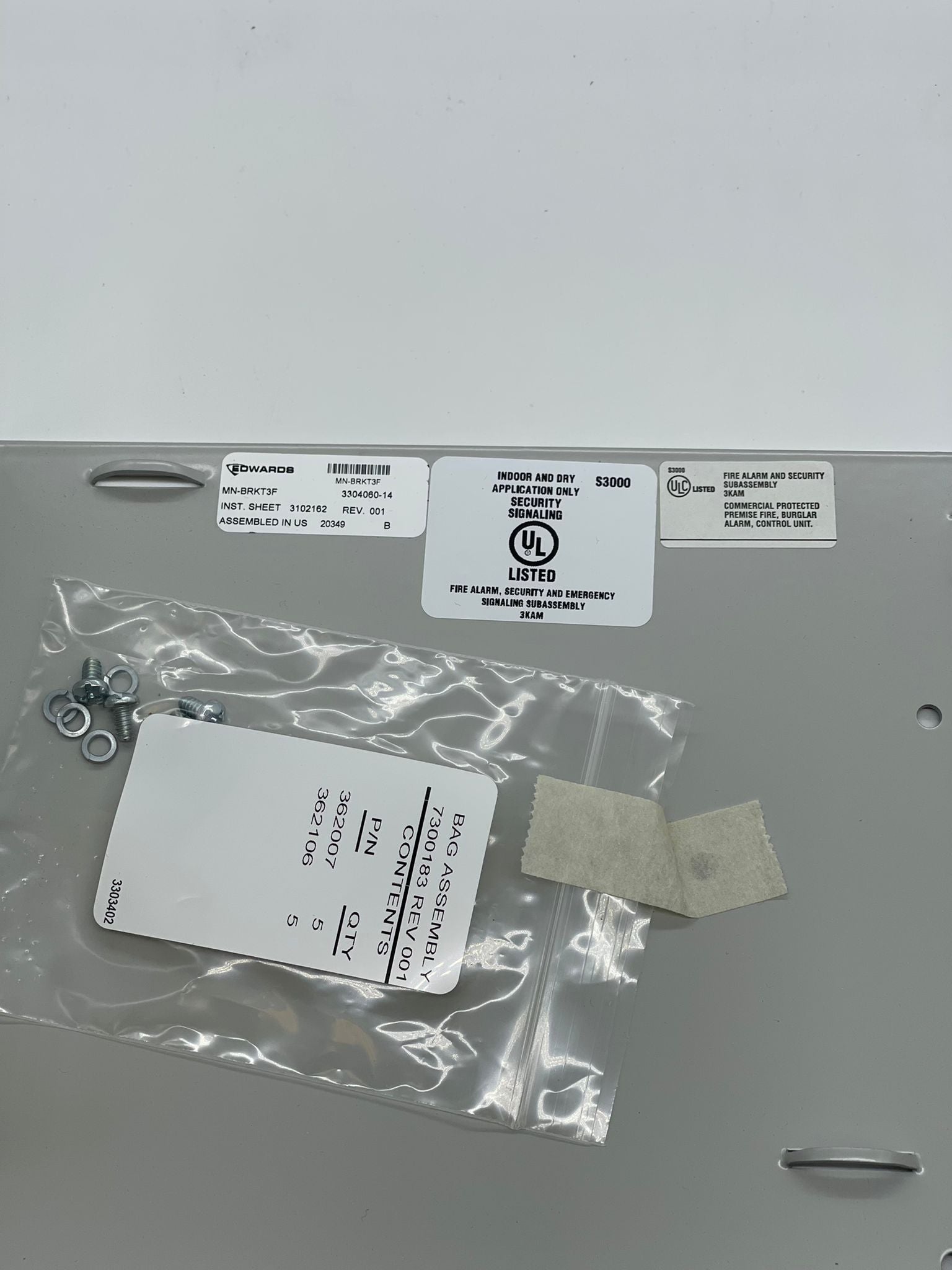 Edwards MN-BRKT3F brackets for JEM systems, metal mounting brackets with multiple holes for secure installation.