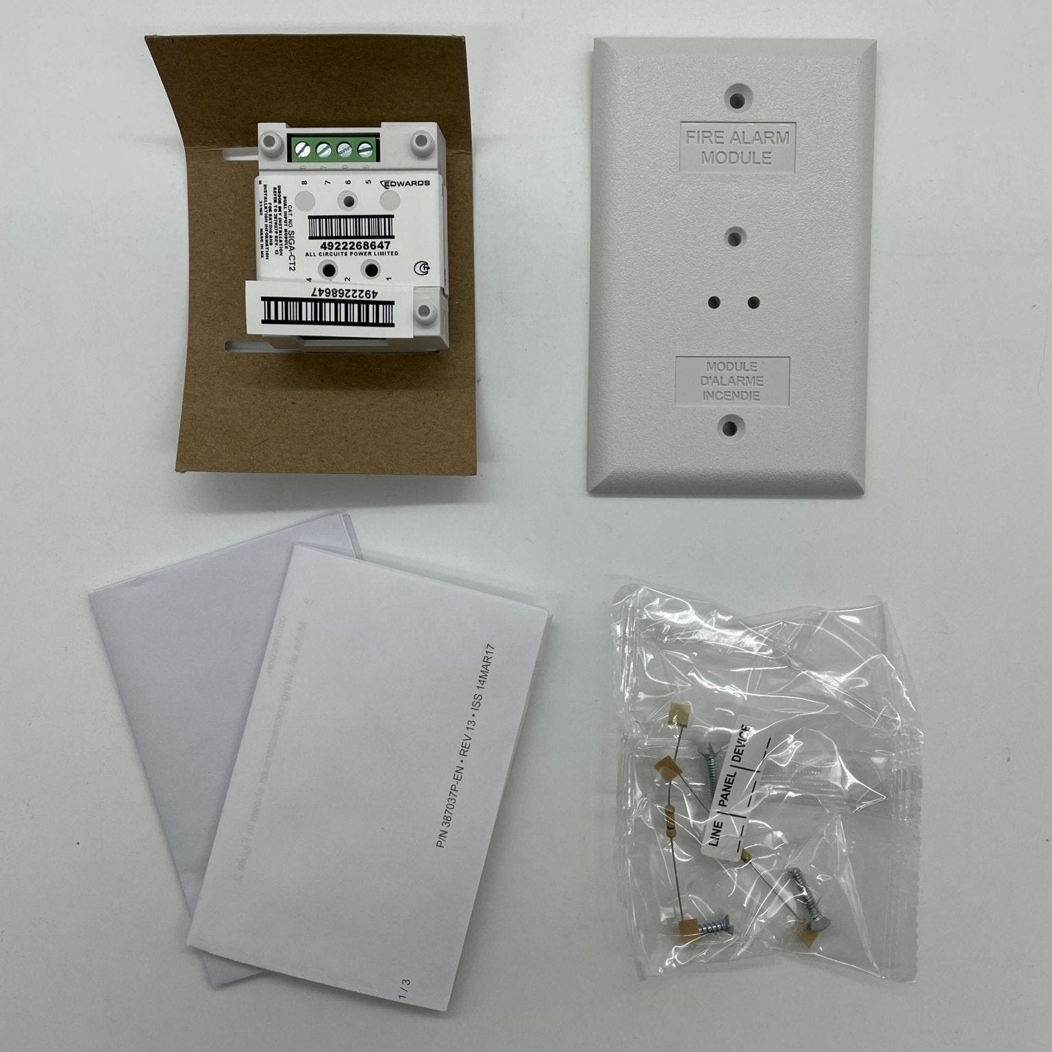 Edwards SIGA-CT2 modules for fire protection systems, showing detailed components and wiring in a professional installation setup.