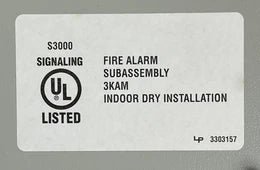 Edwards QS1-1-G-2 fire alarm with digital display and sensor, mounted on a wall for safety detection in commercial buildings.