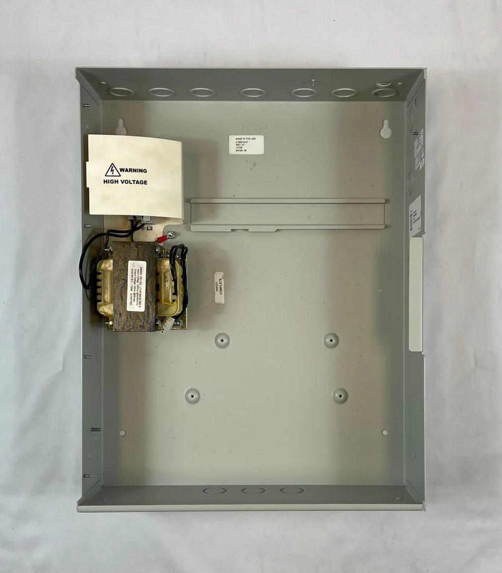 Edwards QS1-1-G-2 fire alarm detector mounted on ceiling, part of Edwards fire alarm system, with visible wiring and mounting hardware.