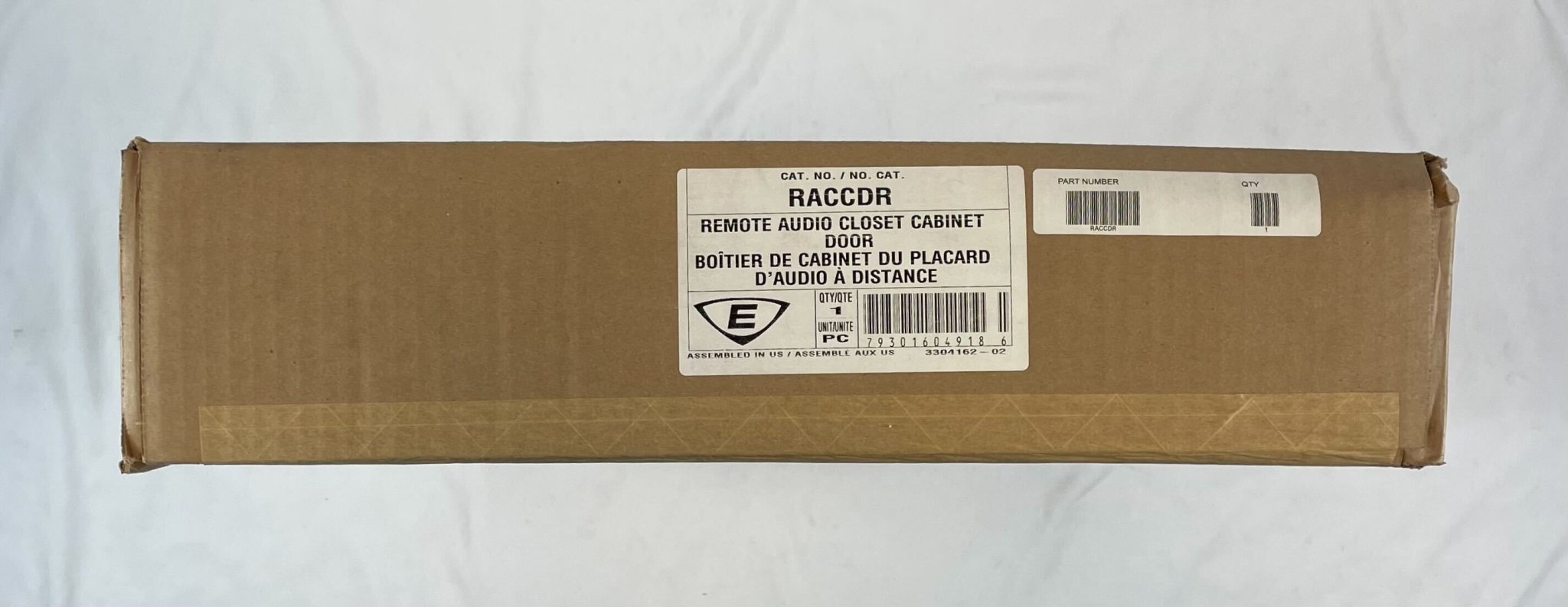 Edwards RACCDR fire alarm detector mounted on ceiling, part of Edwards fire alarm system, with a sleek white design.