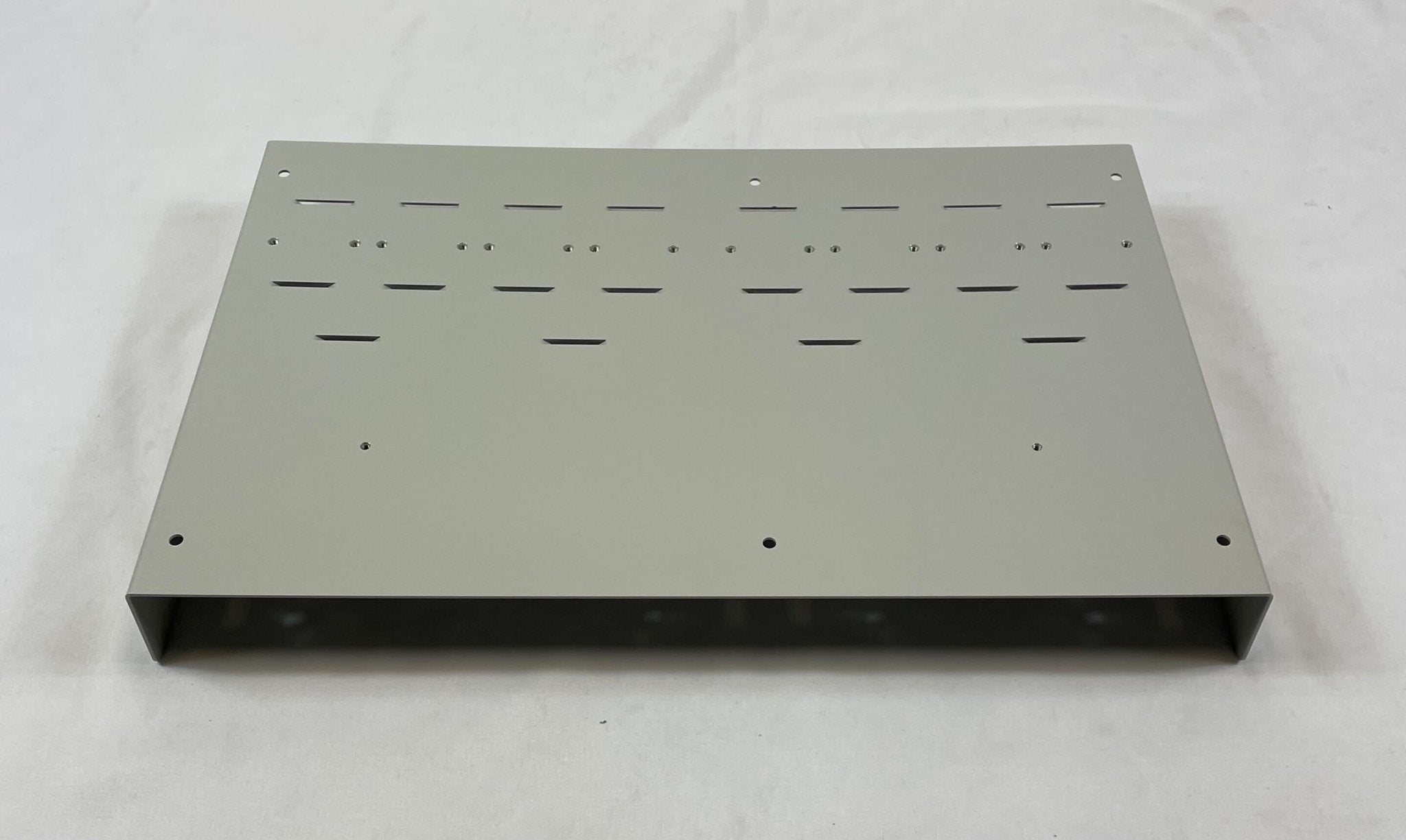 Edwards RC-BRKT mounting bracket for Jem Systems, metal construction with screw holes, designed for secure installation.