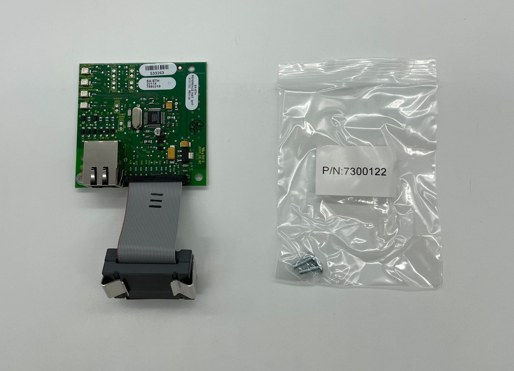 Edwards SA-ETH network card installed in a server, showing Ethernet ports and circuit board details.
