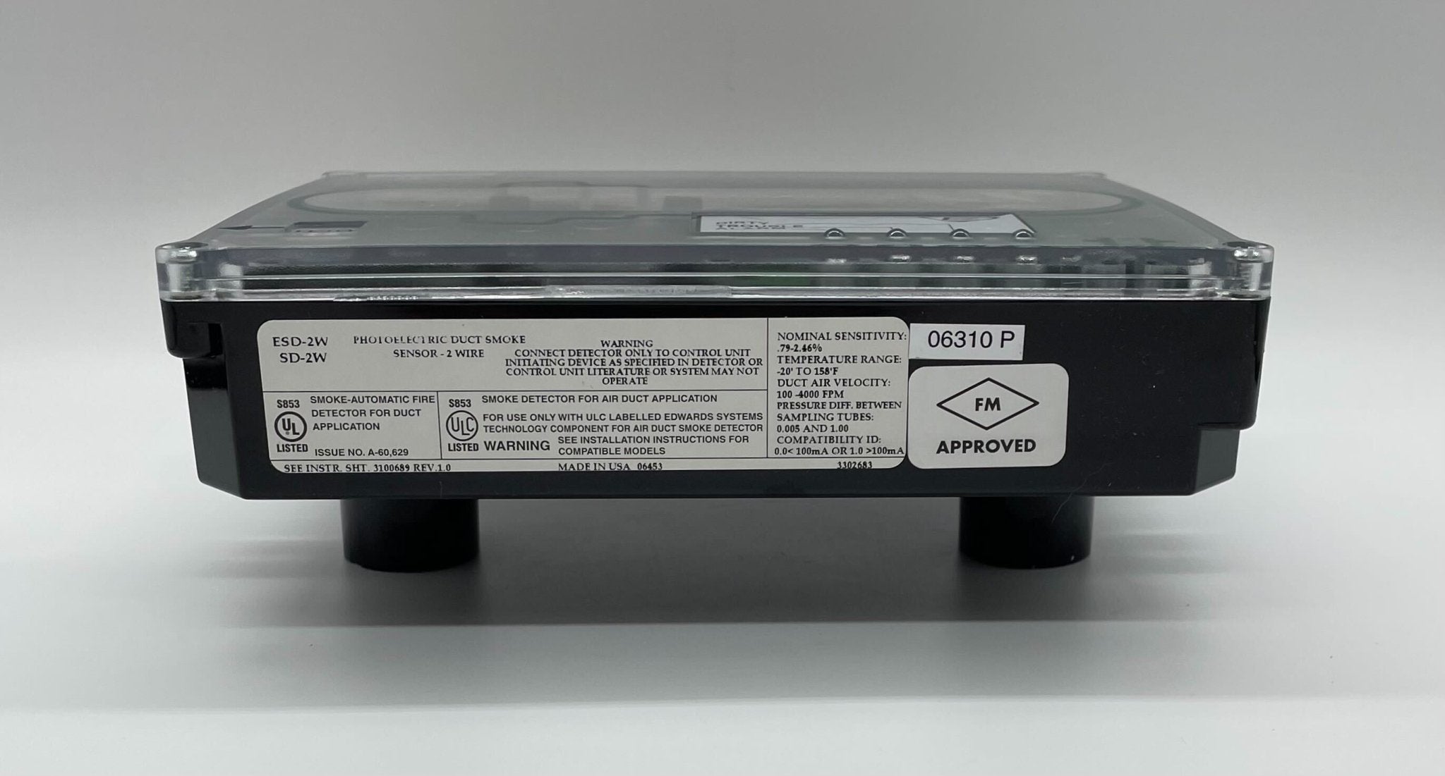 Edwards SD-2W SuperDuct fire alarm detector mounted on a ceiling, designed for industrial fire detection and safety.