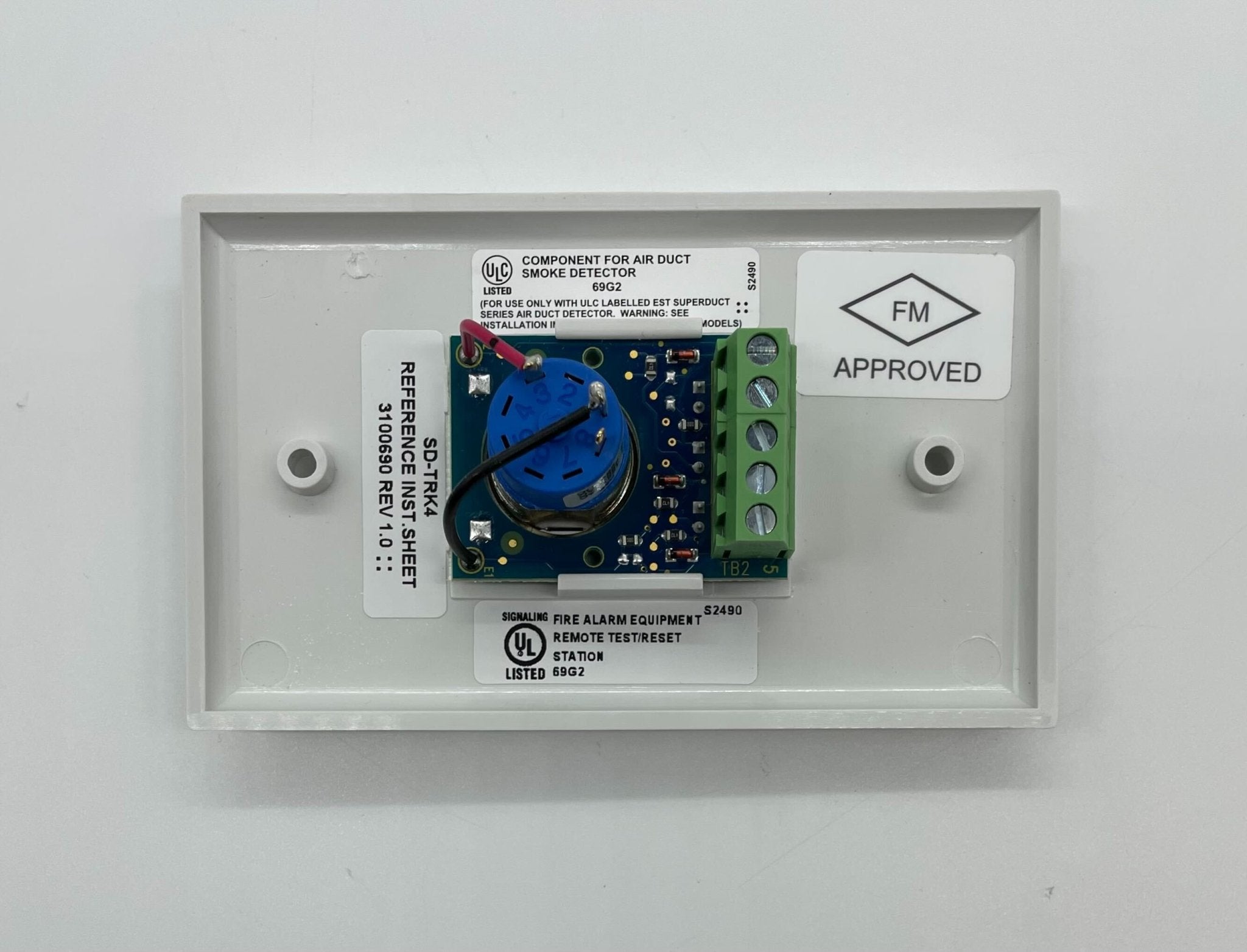 Edwards SD-TRK4 duct detector installed in HVAC duct system, used for airflow and smoke detection.