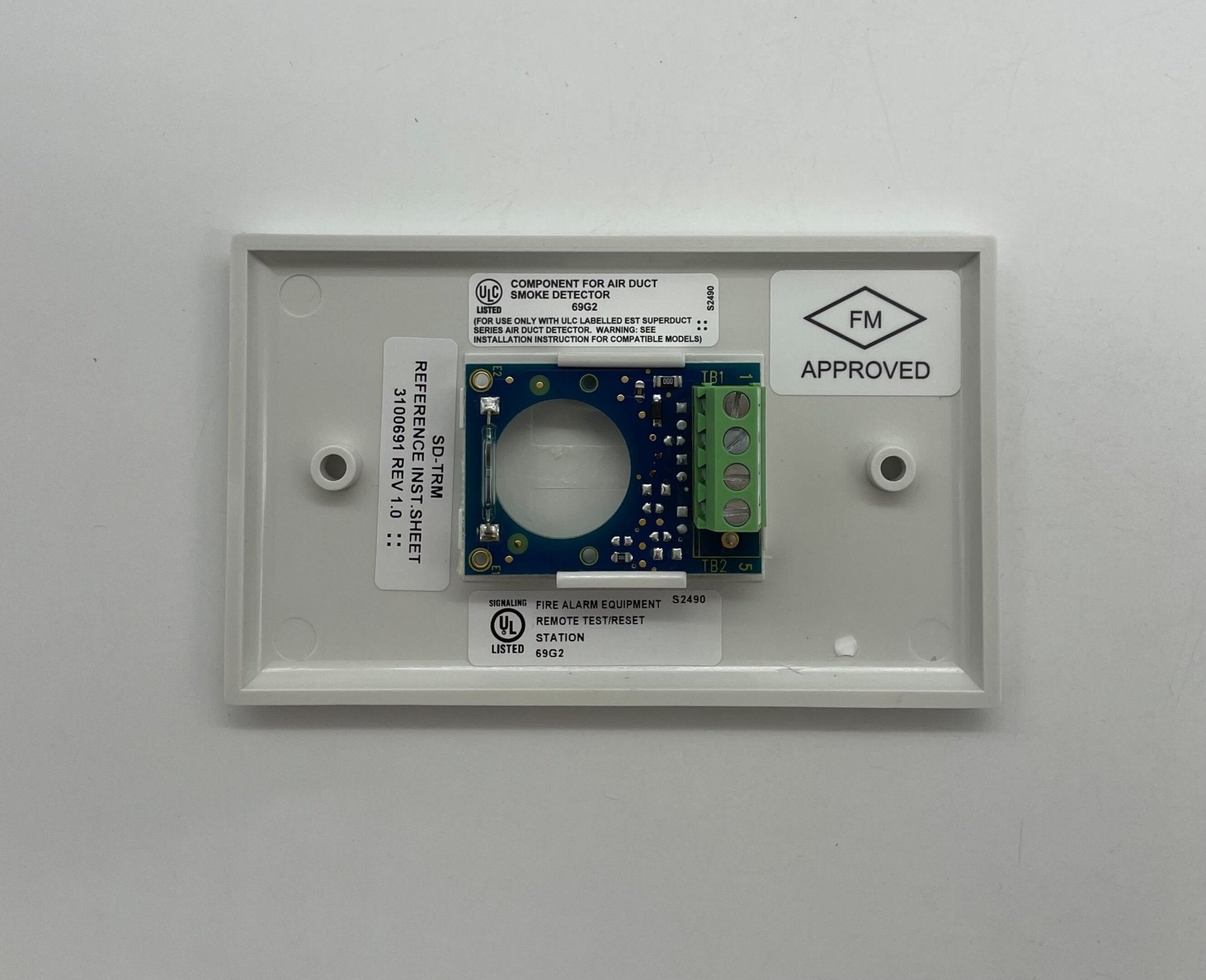 Edwards SD-TRM duct detector installed in HVAC system, designed for smoke detection in ventilation ducts.