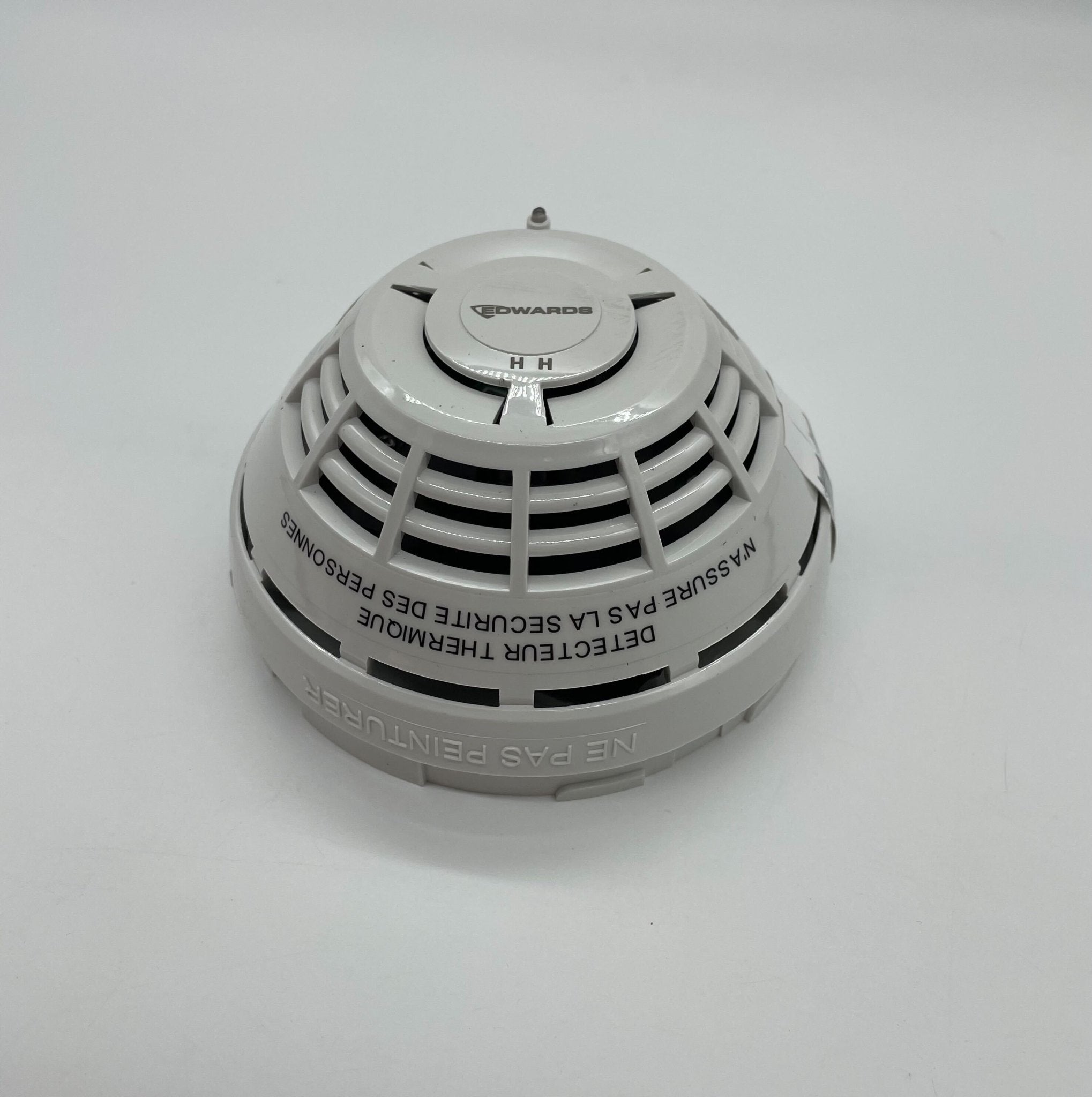 Edwards SIGA-H2D heat detector mounted on ceiling, part of Jem Systems Canada fire safety equipment.