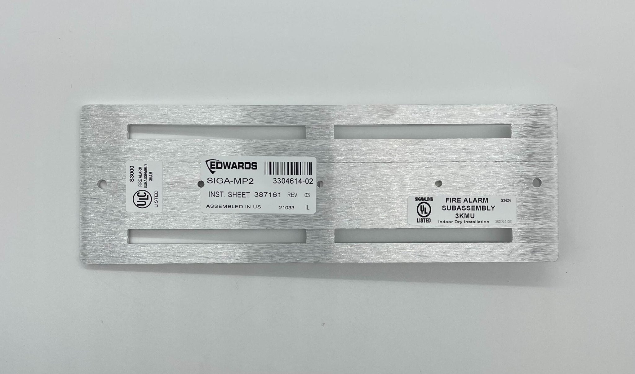 Edwards SIGA-MP2 modules from Jem Systems Canada, featuring compact industrial components with metallic and electronic elements.