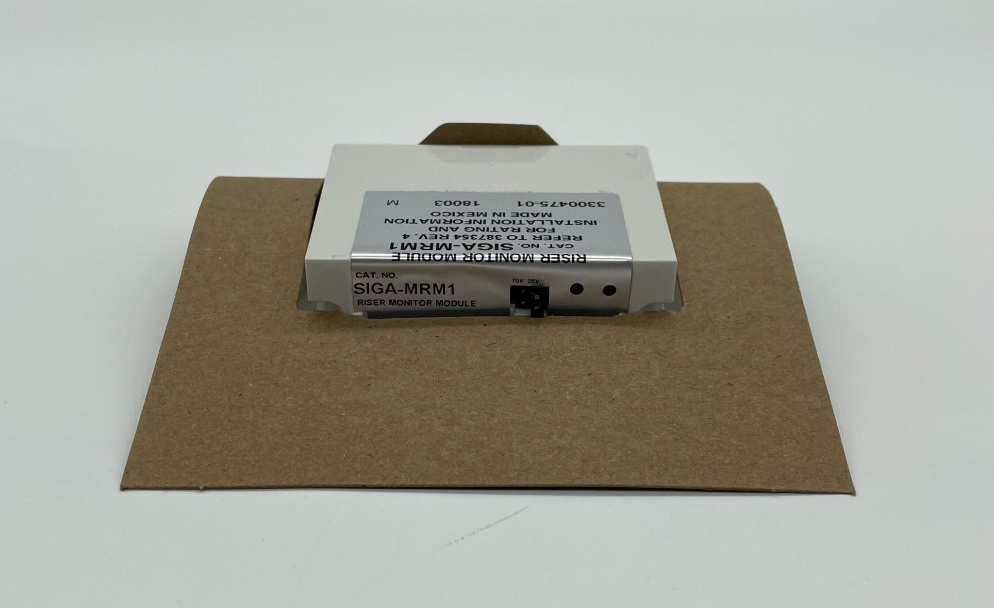 Edwards SIGA-MRM1 module installed in Jem Systems setup, showing compact industrial module with connectors and control interface.