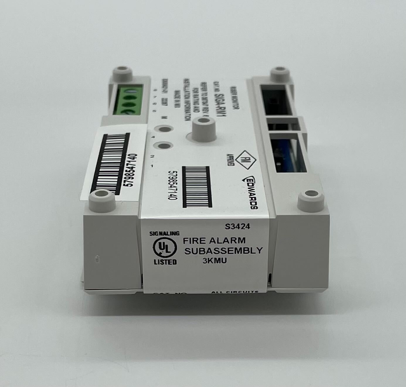 Edwards SIGA-RM1 module by Jem Systems Canada, shown in a close-up of the compact industrial control module.
