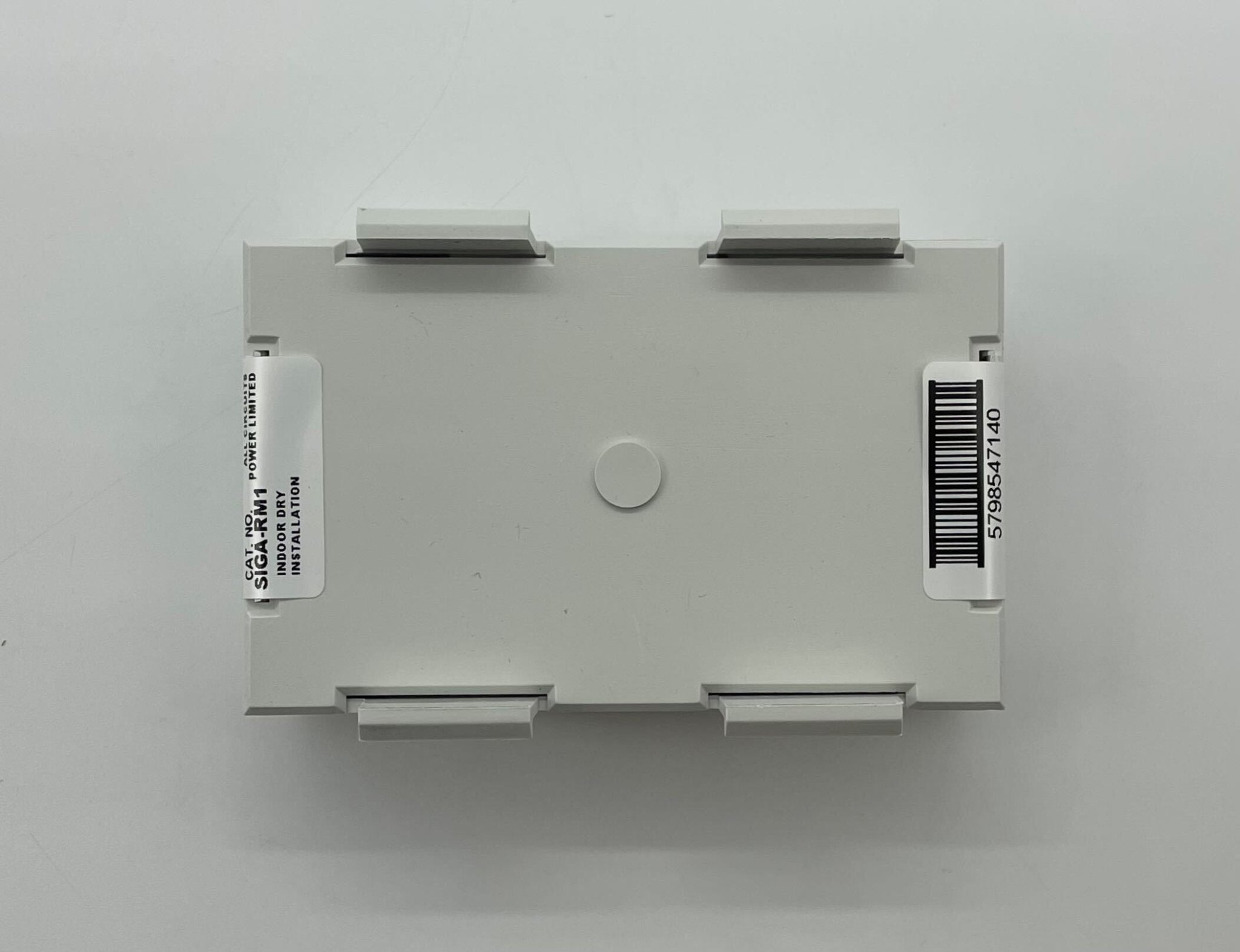 Edwards SIGA-RM1 module by Edwards, shown in a close-up of the compact industrial electronic component.