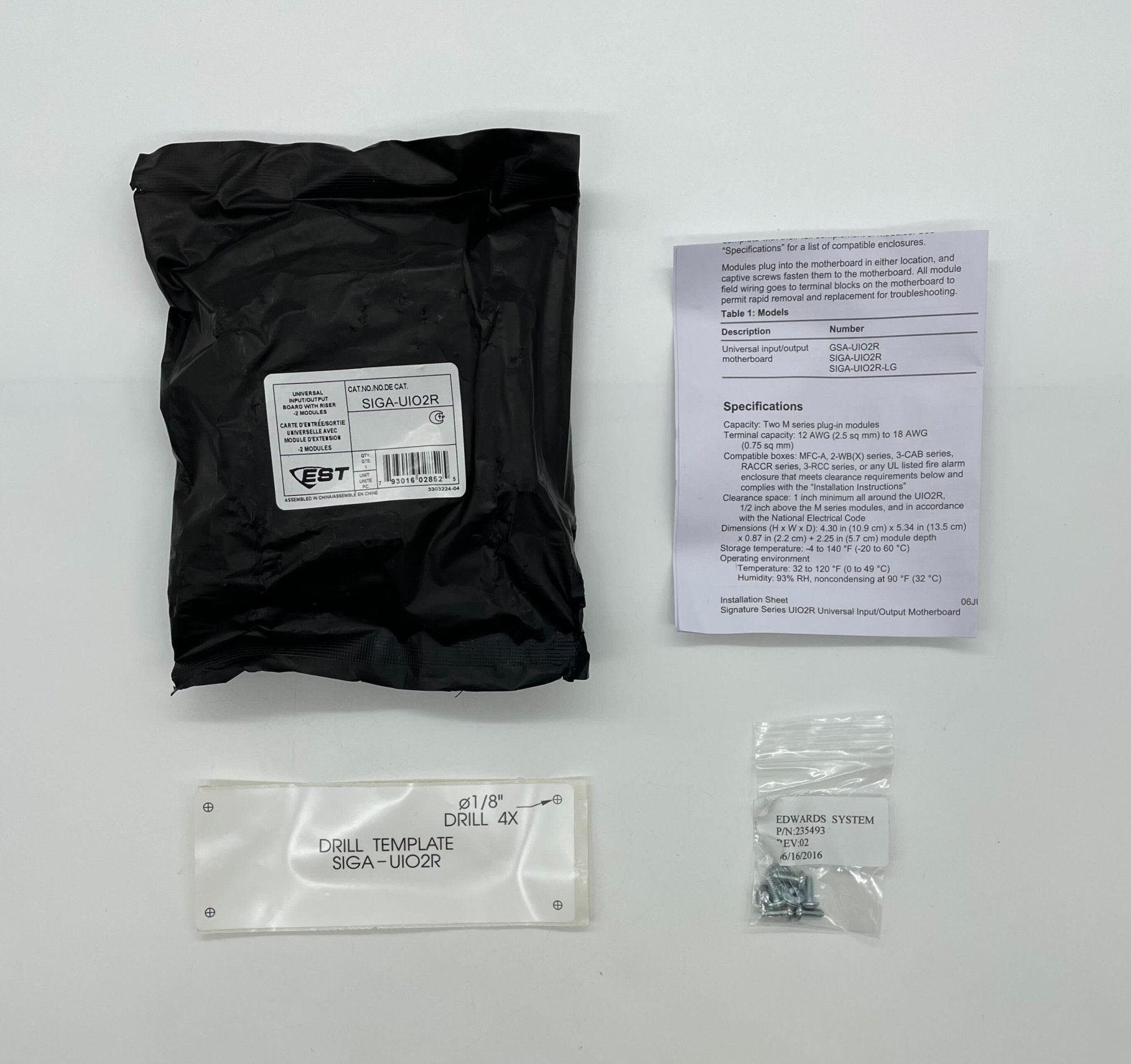 Edwards SIGA-UIO2R gas detector sensor with electronic components, mounted on a white background.