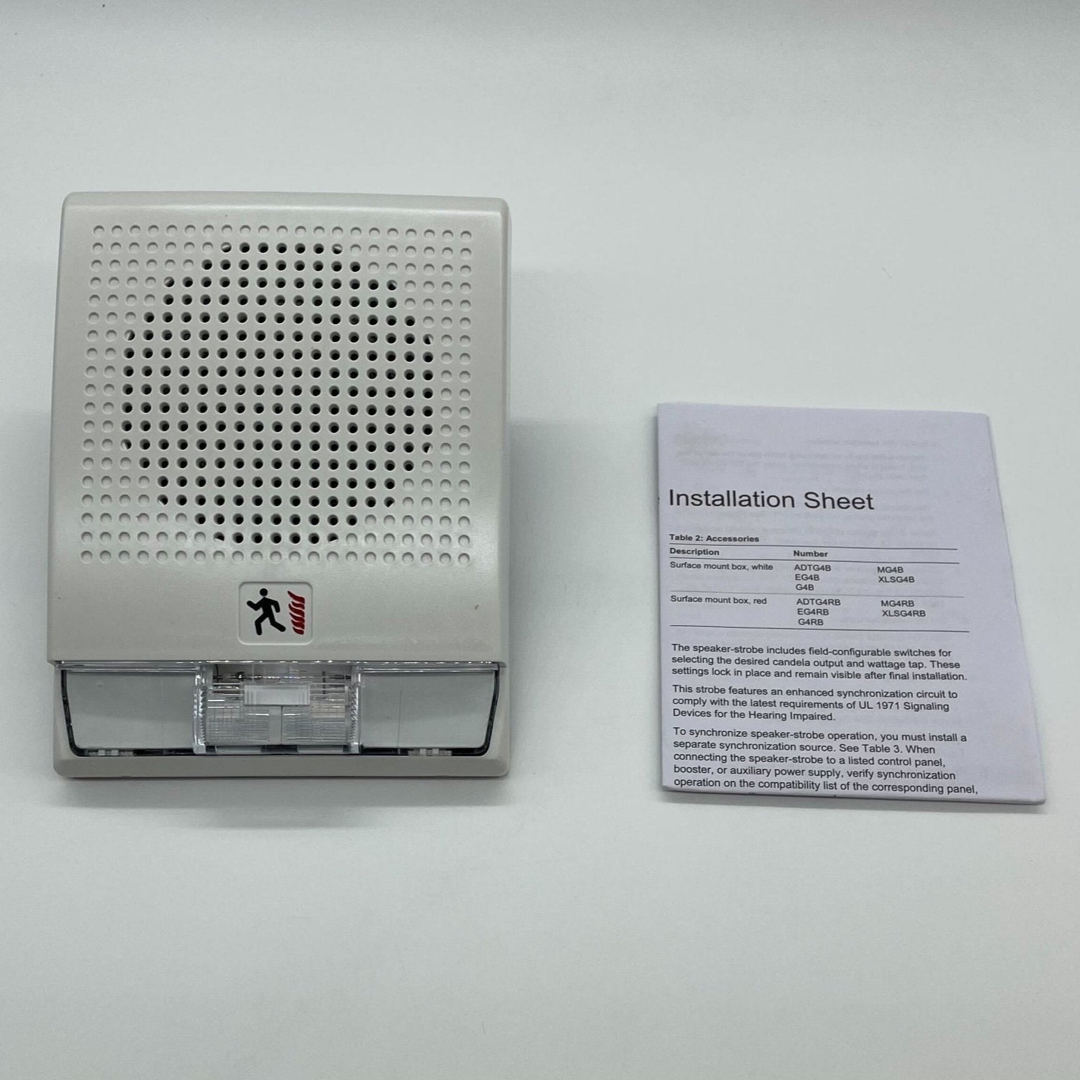 Edwards G4-S7VM fire alarm sensor showing a sleek, white alarm device with sensor components for fire detection.